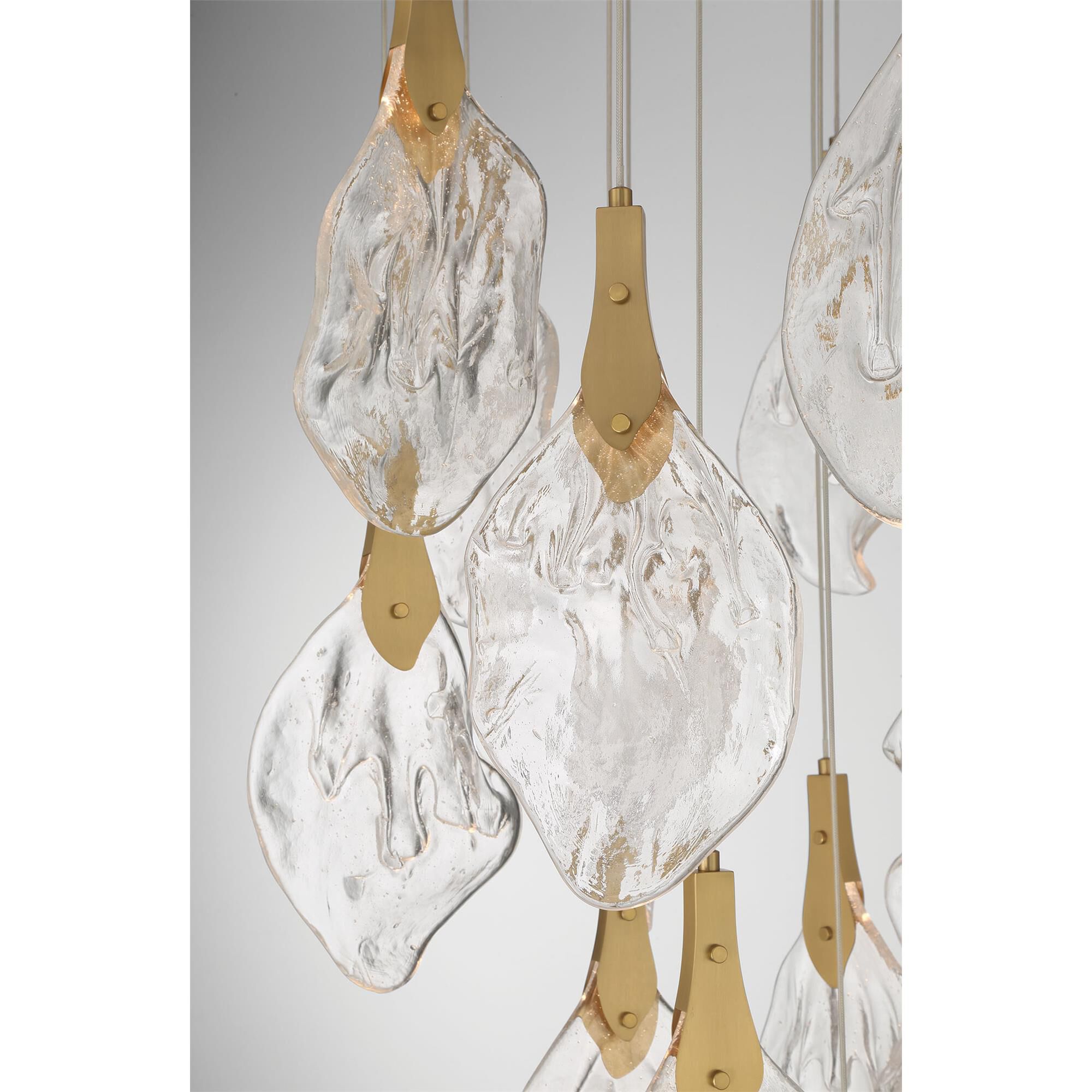 Shown in Gold finish and Clear Organic glass