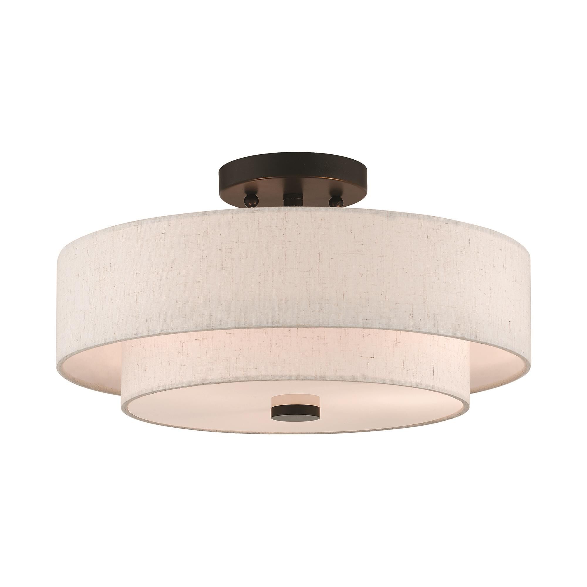 Shown in English Bronze finish and Hand Crafted Oatmeal Color Fabric Outside & White Fabric Inside Hardback shade