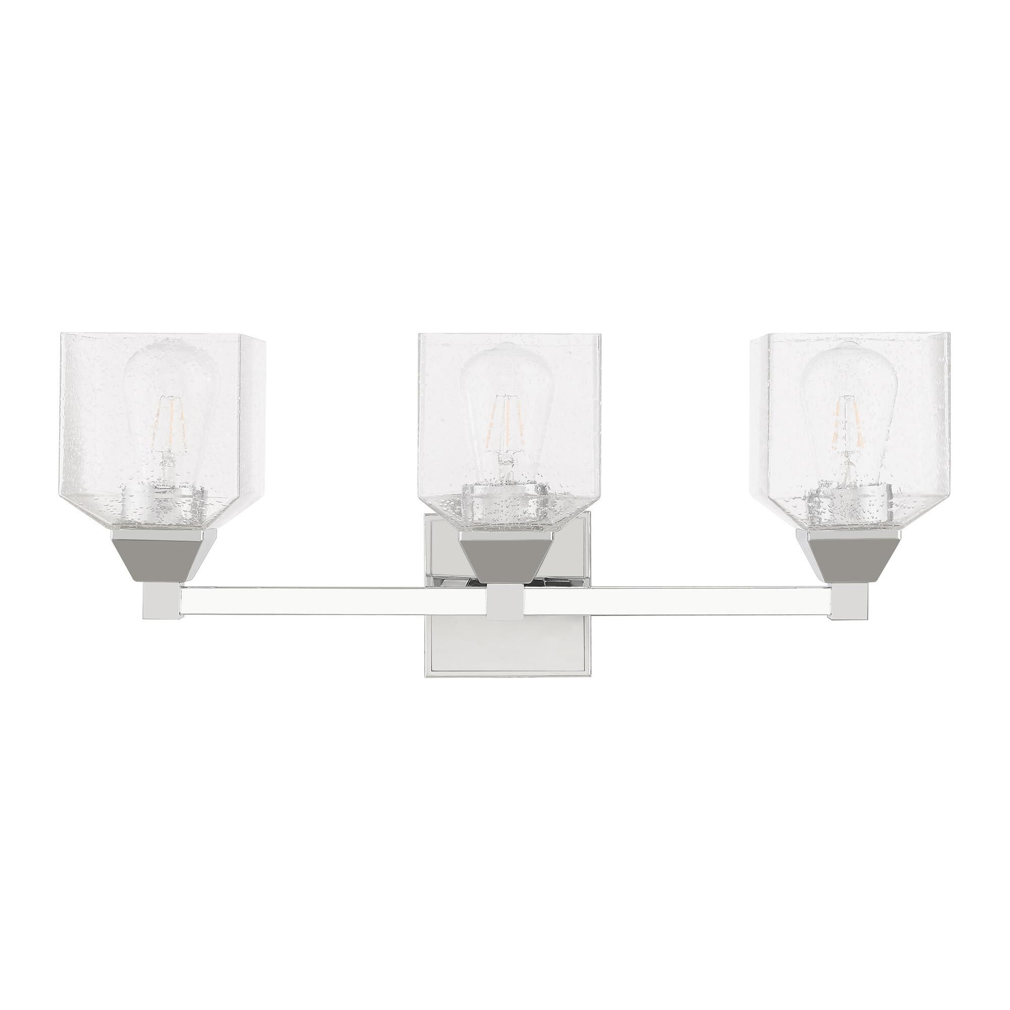 Shown in Polished Chrome finish and Hand Blown Clear Seeded glass
