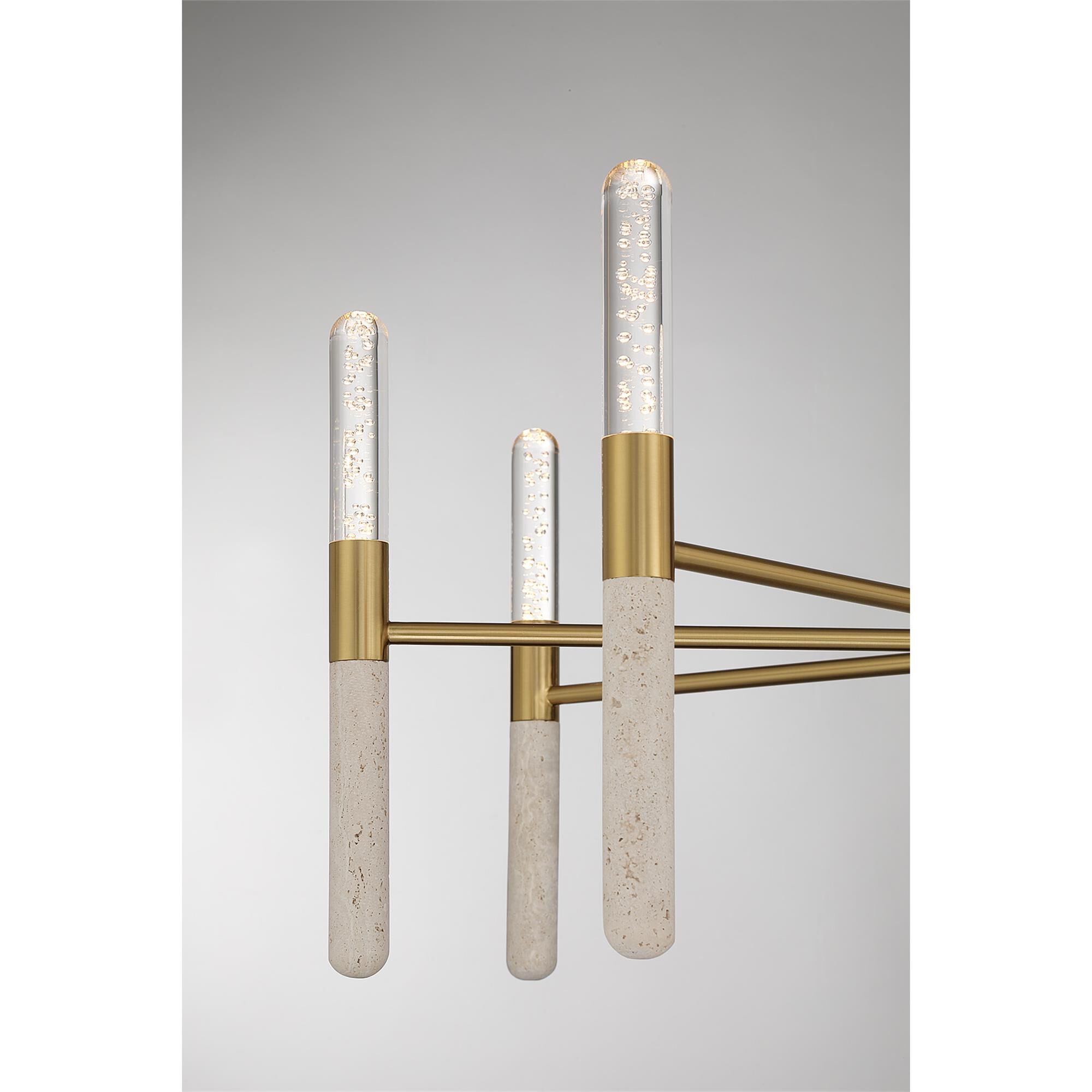Shown in Warm Brass finish and Clear Seeded glass and Beige Travertine accent