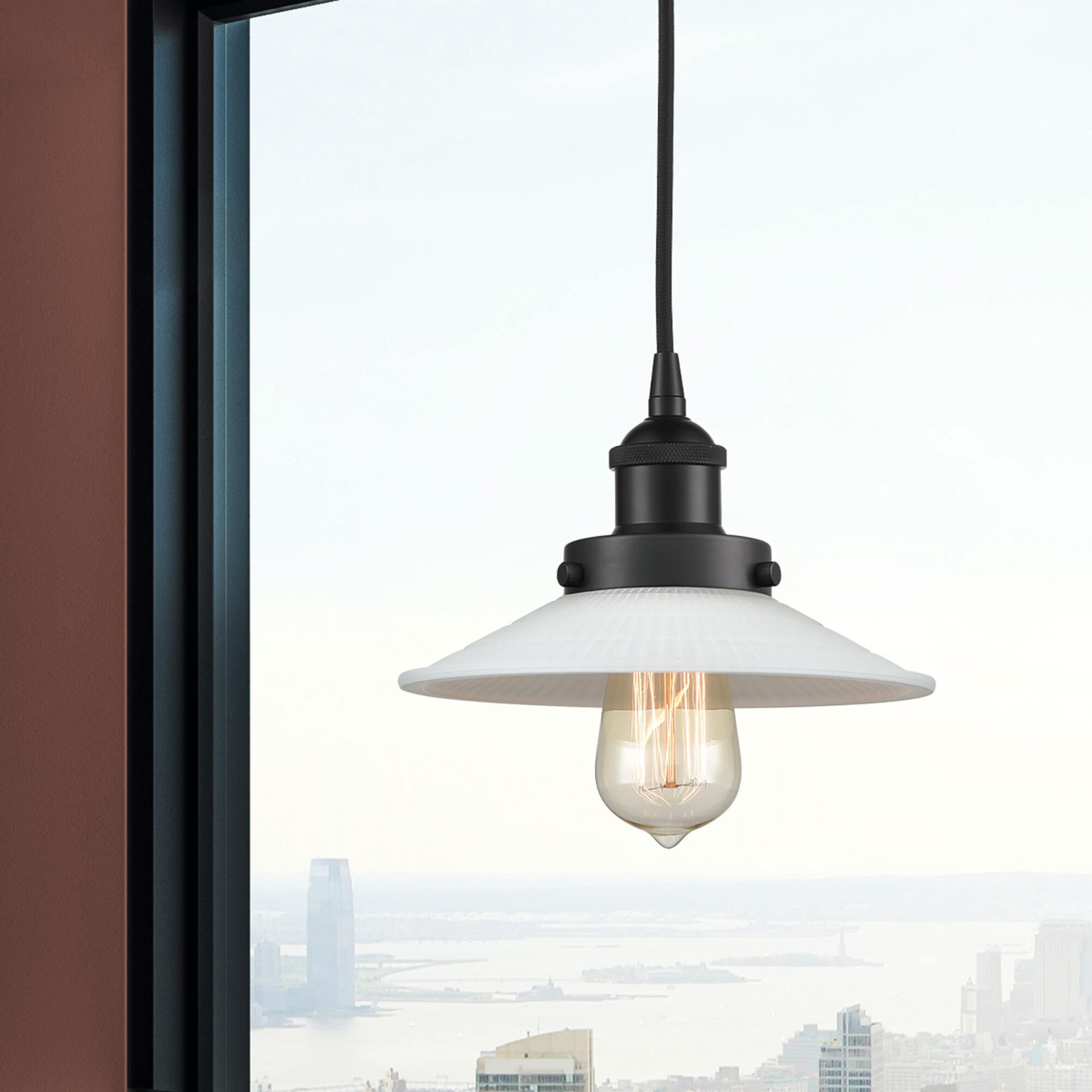 Shown in Matte Black finish and White Halophane glass