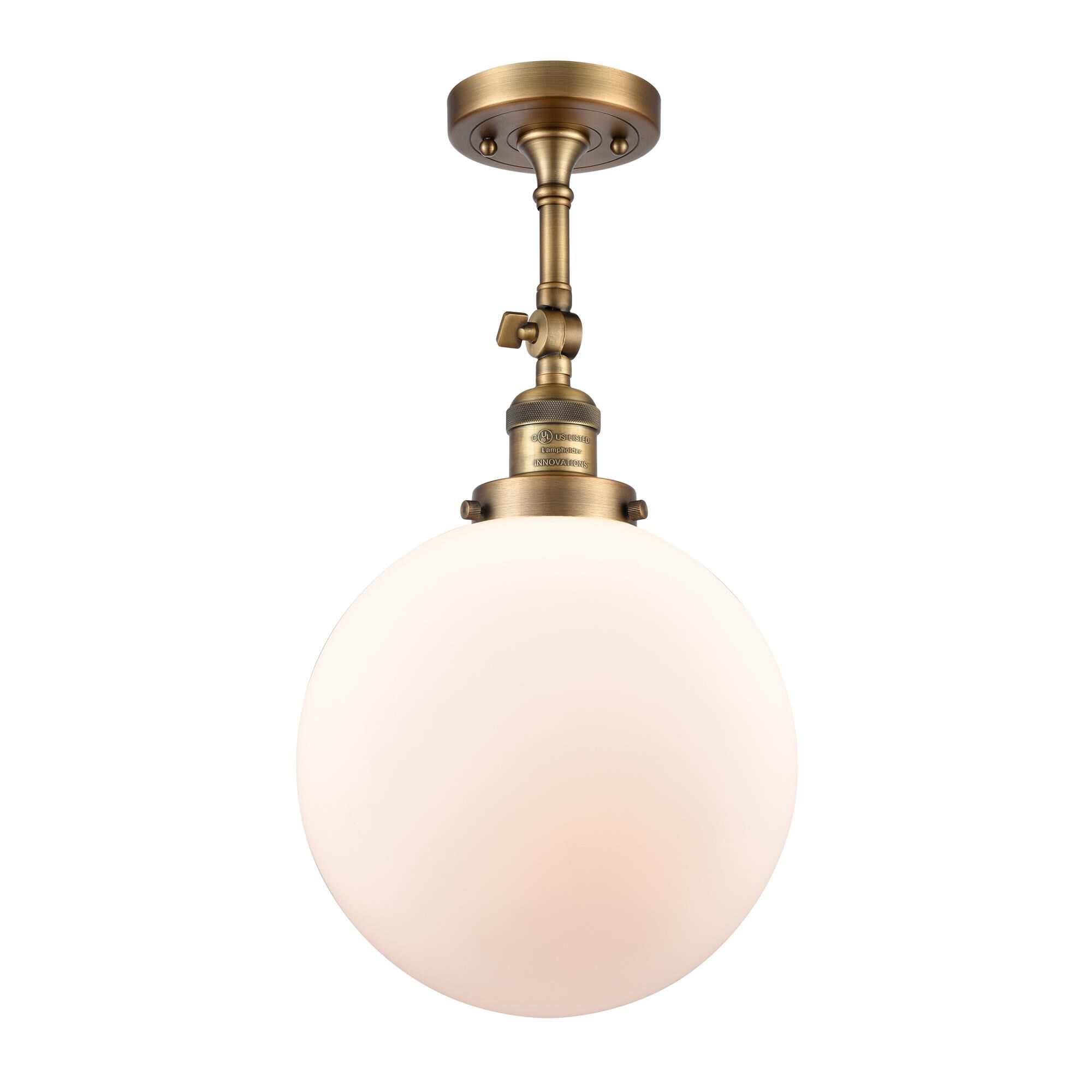 Shown in Brushed Brass finish and Frosted glass