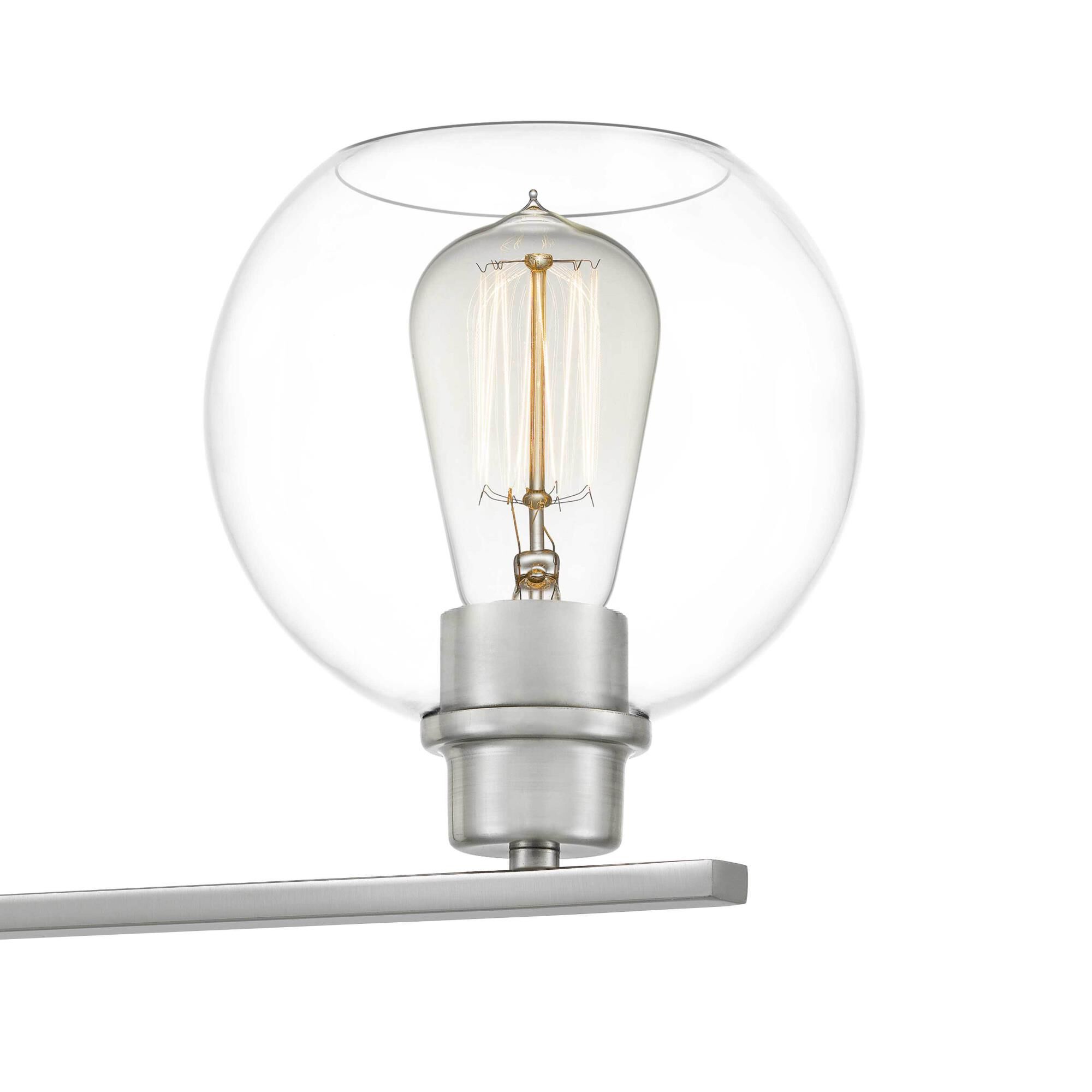 Shown in Brushed Nickel finish and Clear Glass shade