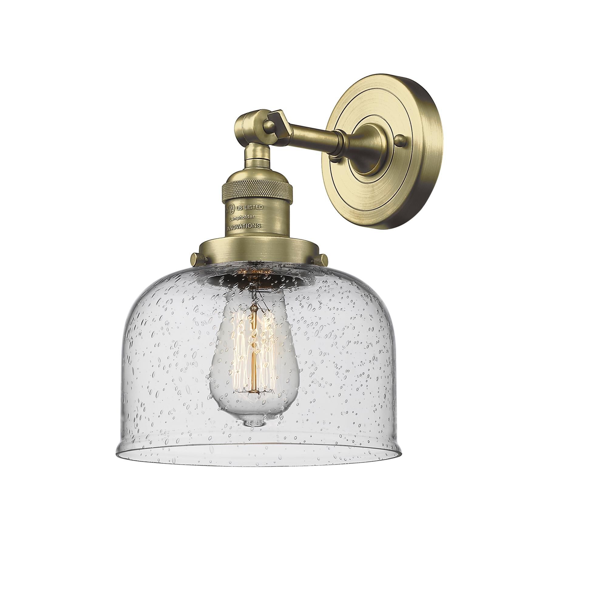 Shown in Antique Brass finish and Seedy glass