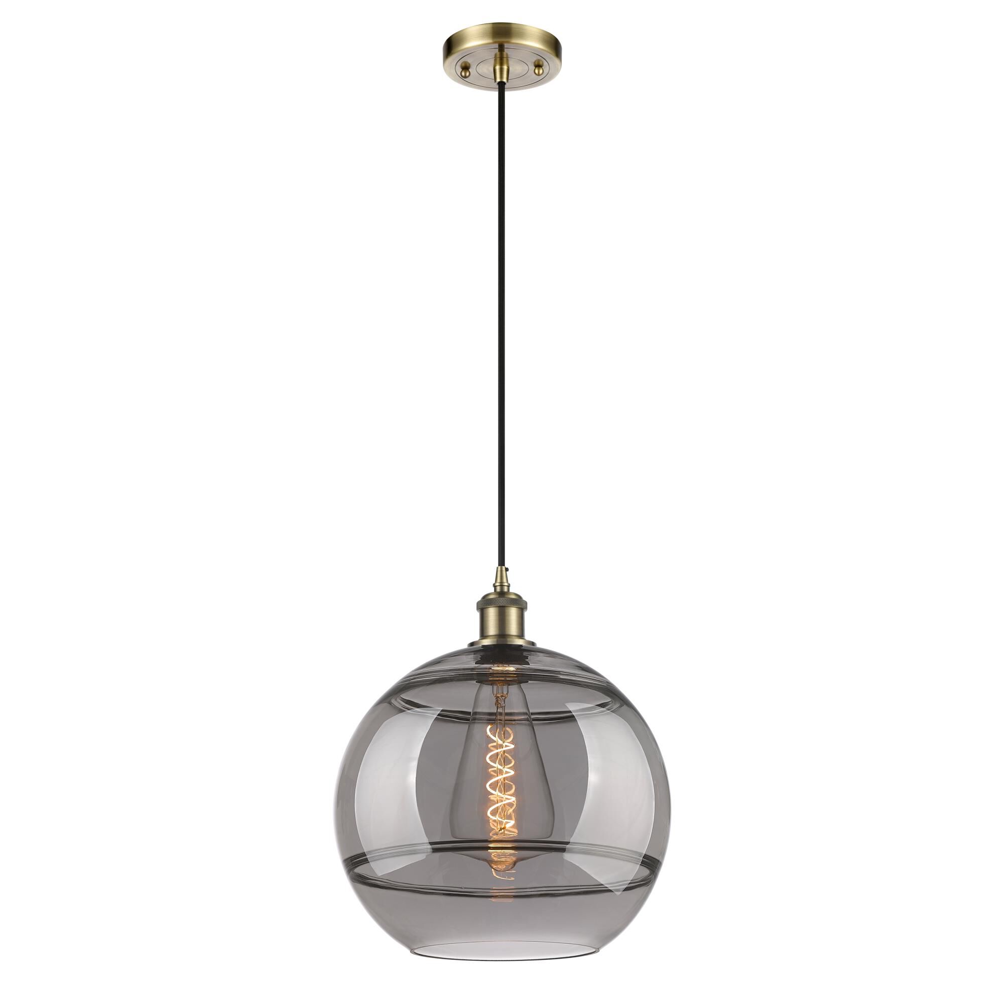 Shown in Antique Brass finish and Light Smoke glass