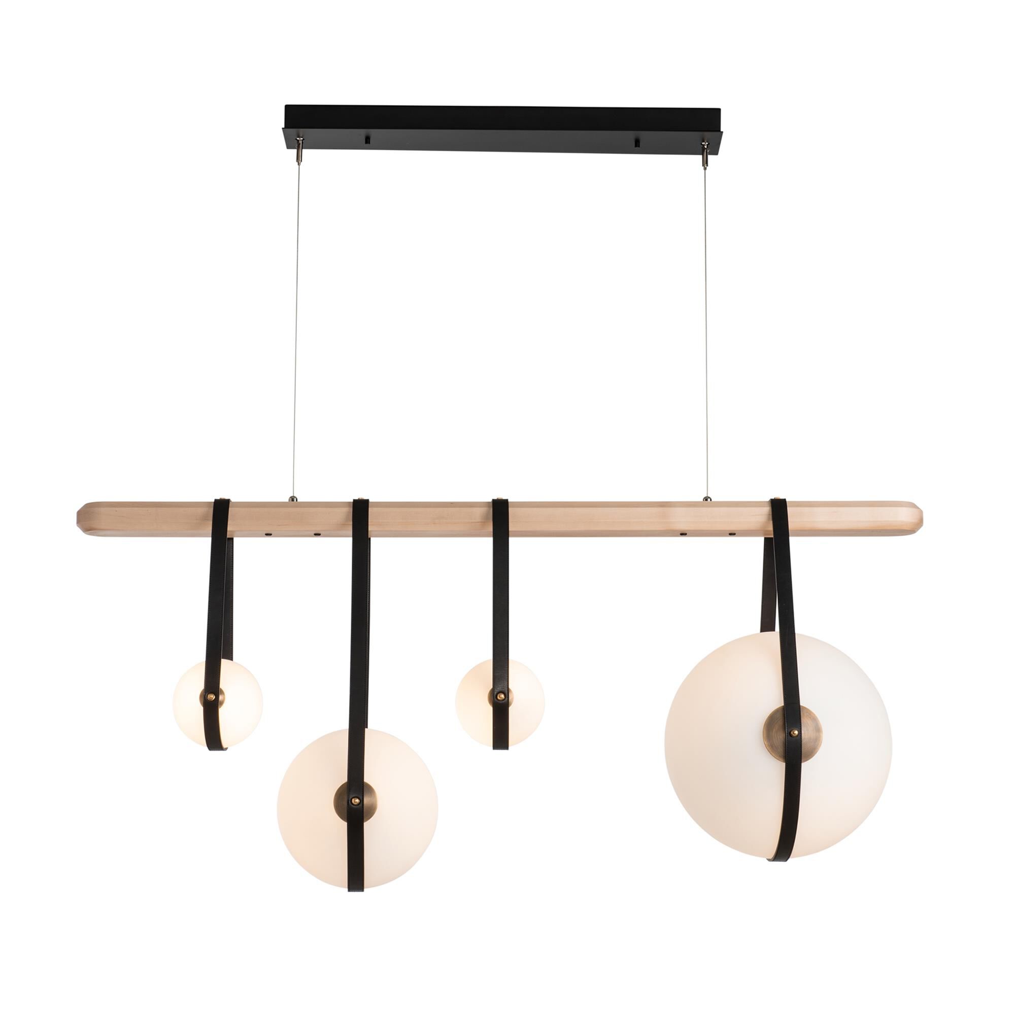 Shown in Black finish and Opal glass and Antique Brass accent