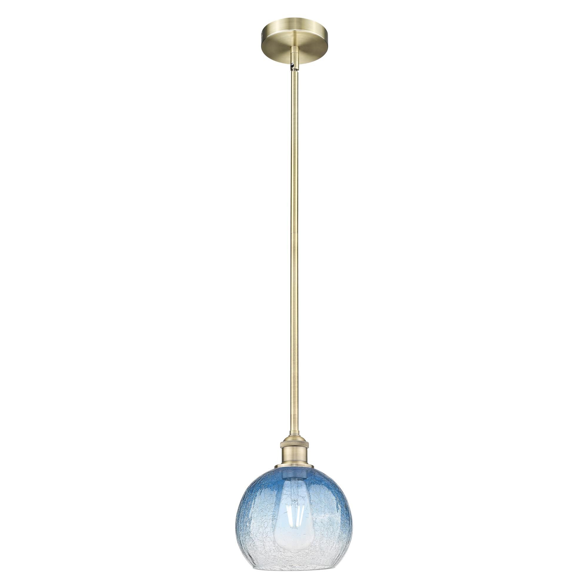 Shown in Antique Brass finish and Sapphire Blue glass