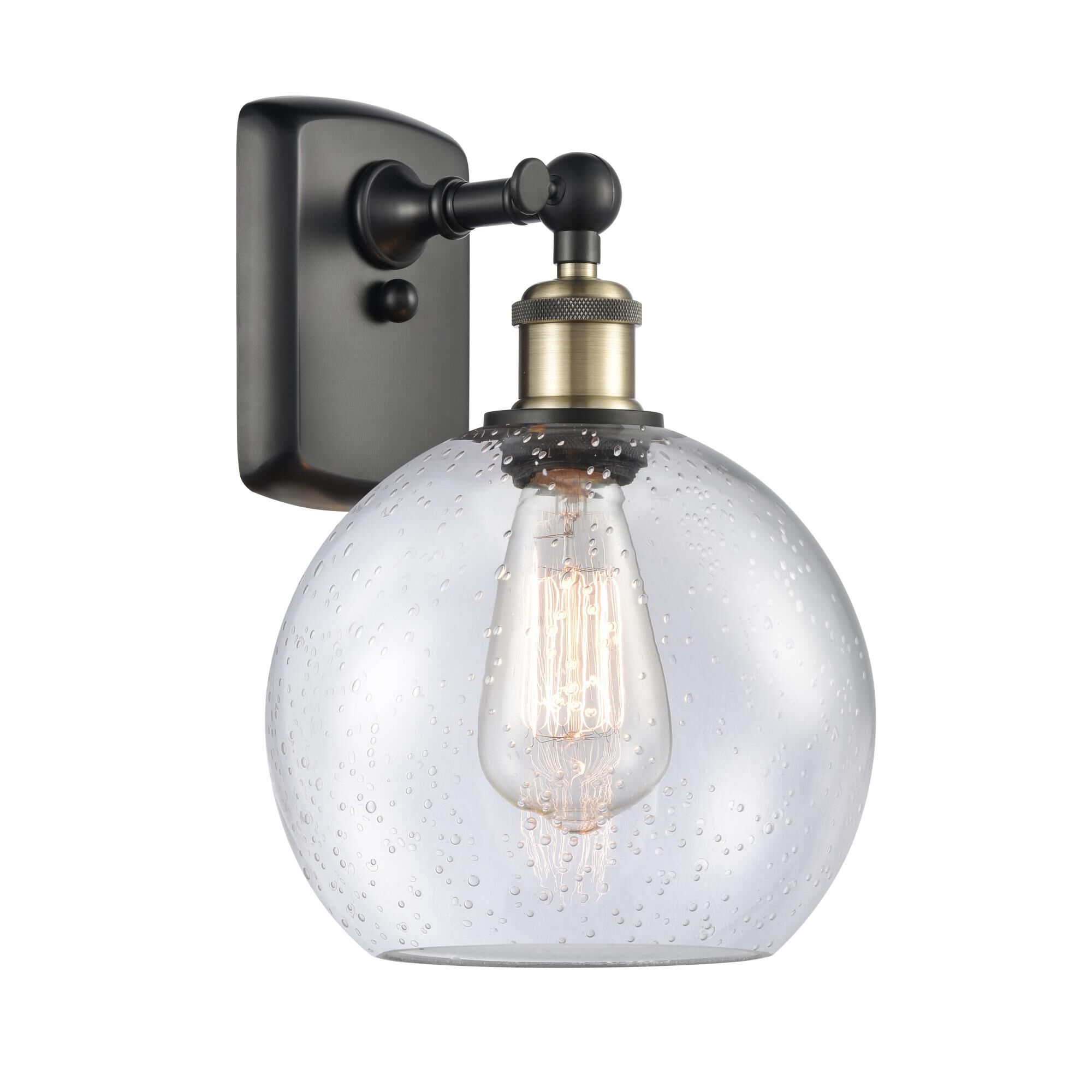 Shown in Black Antique Brass finish and Cased Matte White Seedy glass