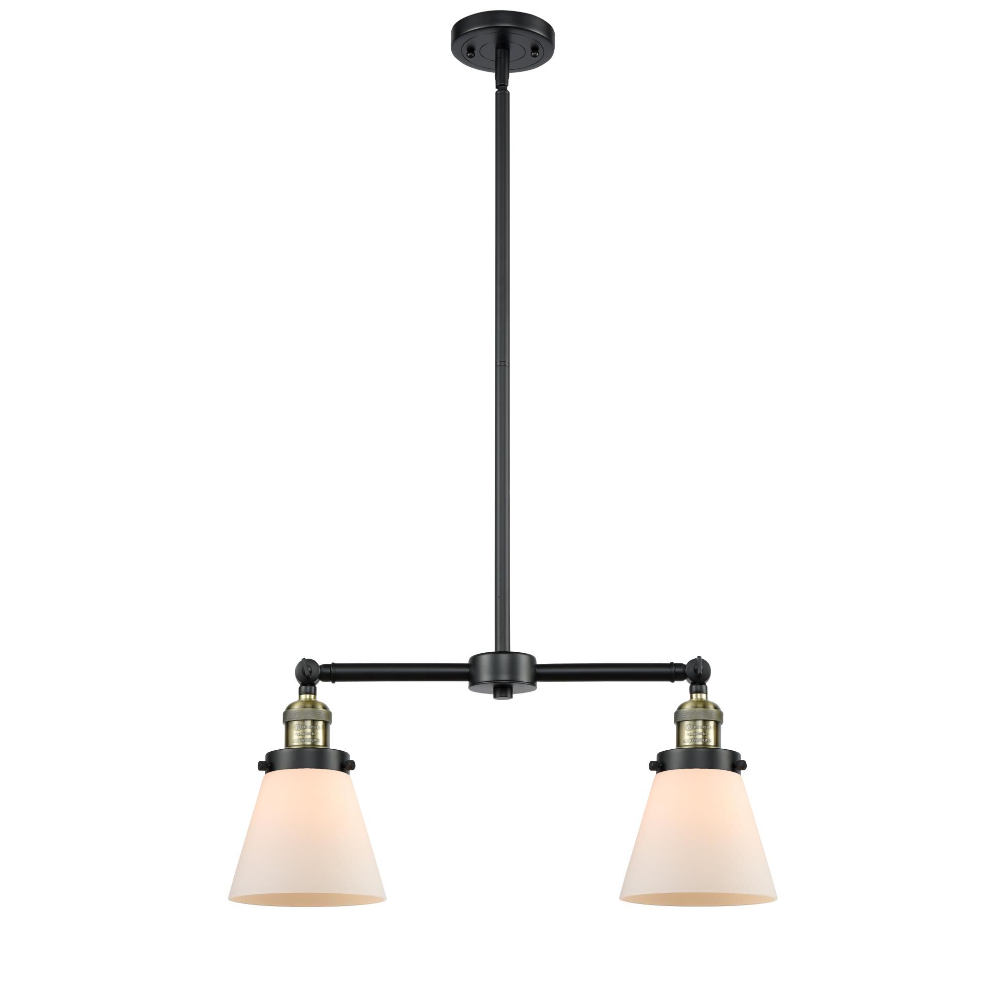 Shown in Black Antique Brass finish and Matte White Cased glass