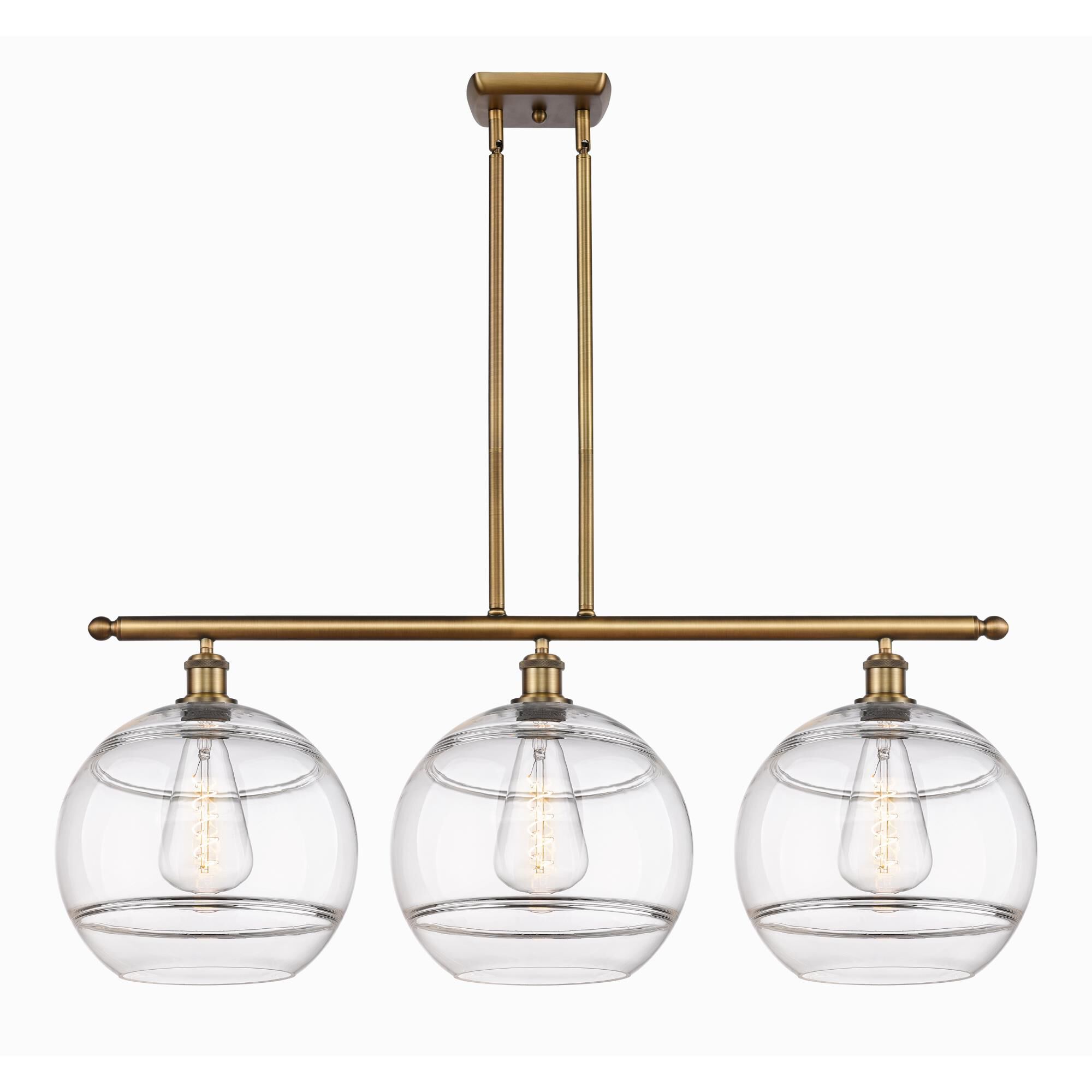 Shown in Brushed Brass finish and Clear glass