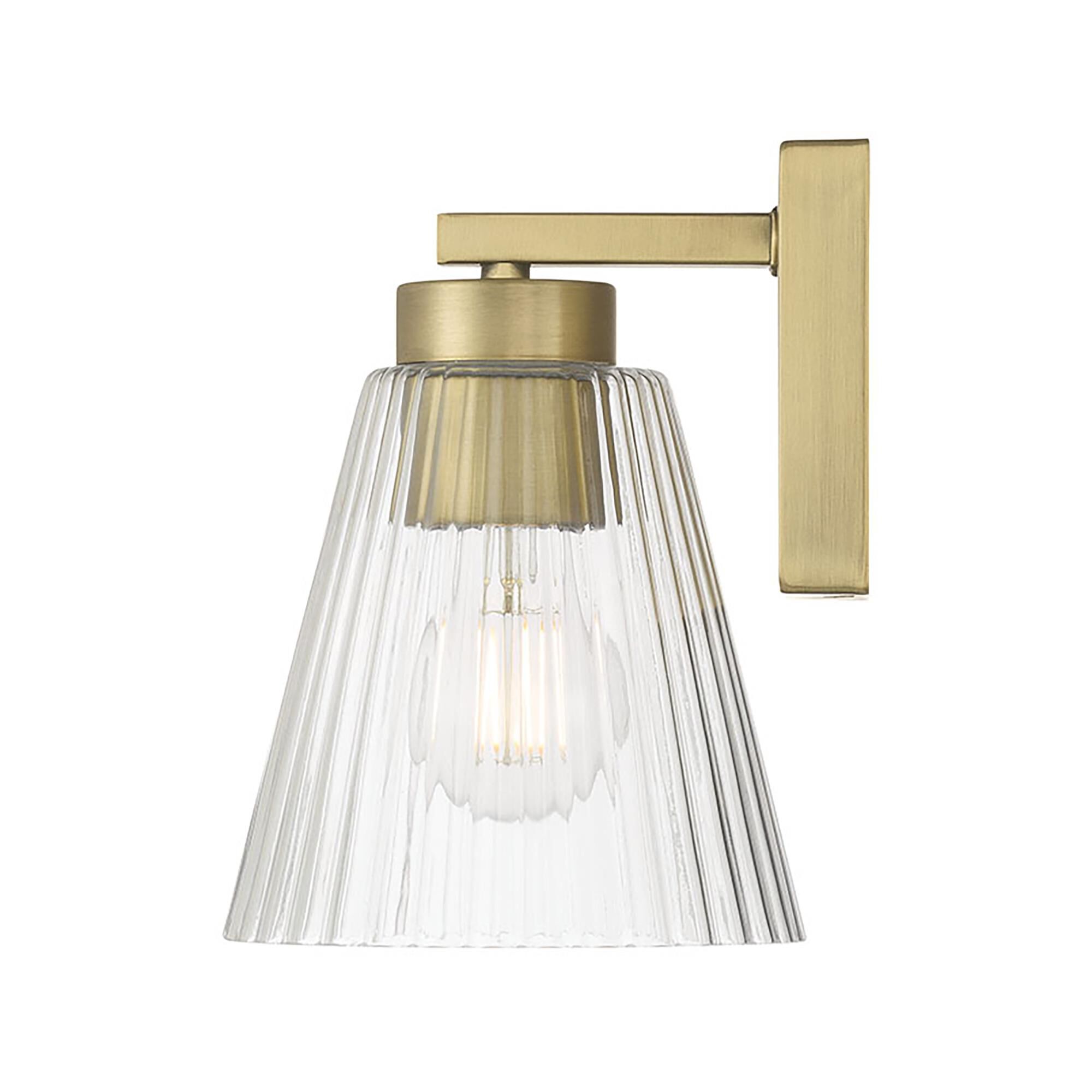 Shown in Vintage Brass finish and Clear Striated glass