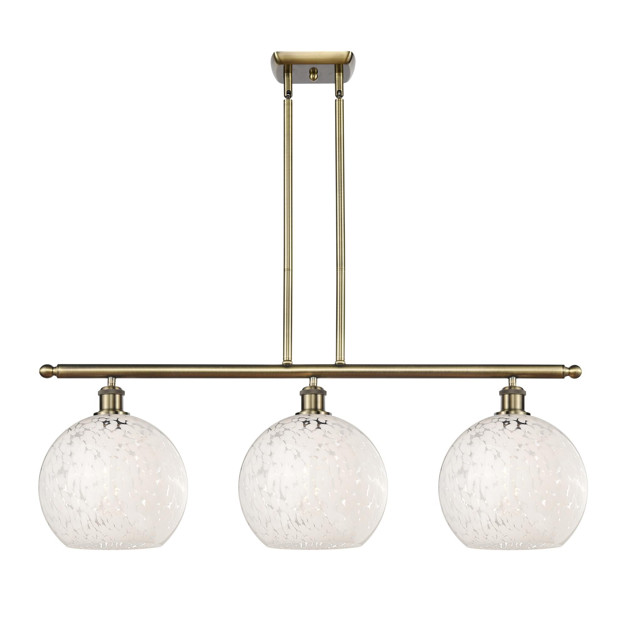 Shown in Antique Brass finish and White Mouchette glass