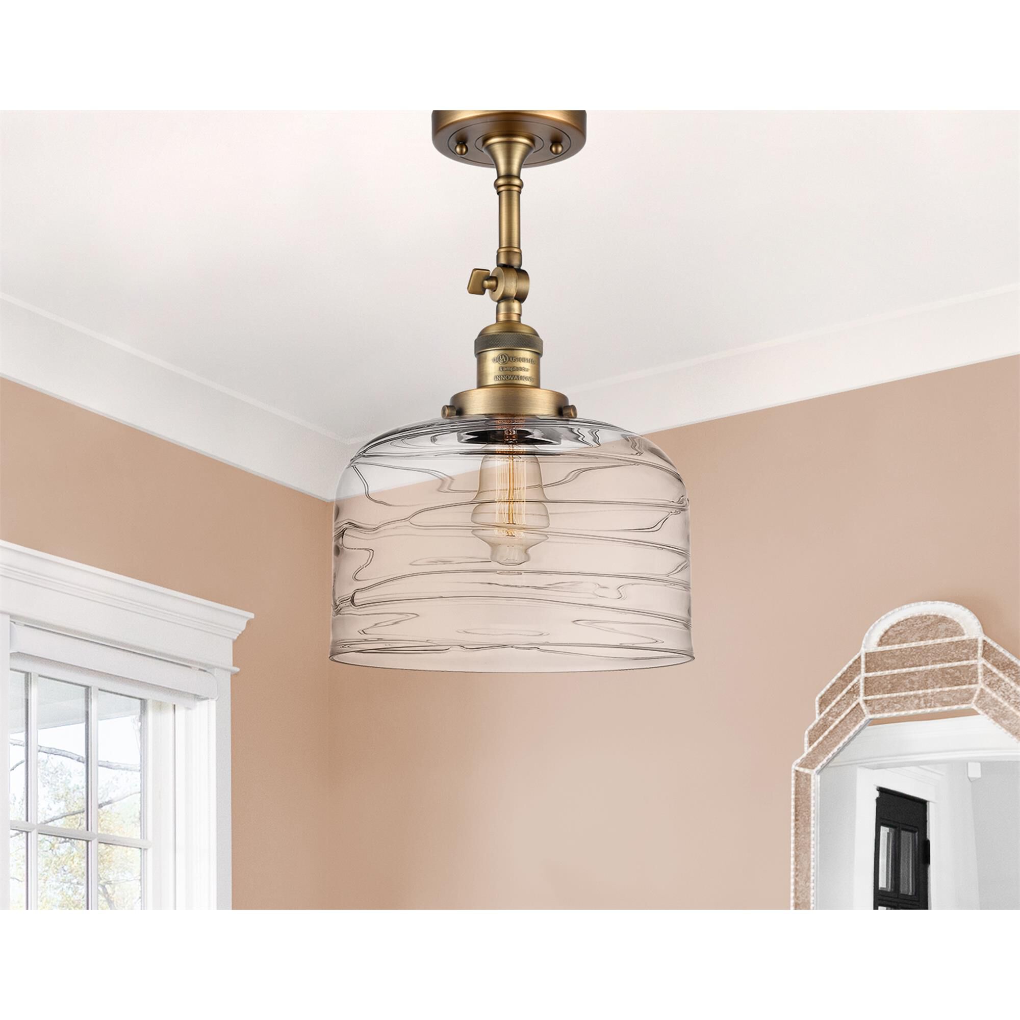 Shown in Brushed Brass finish and Clear glass