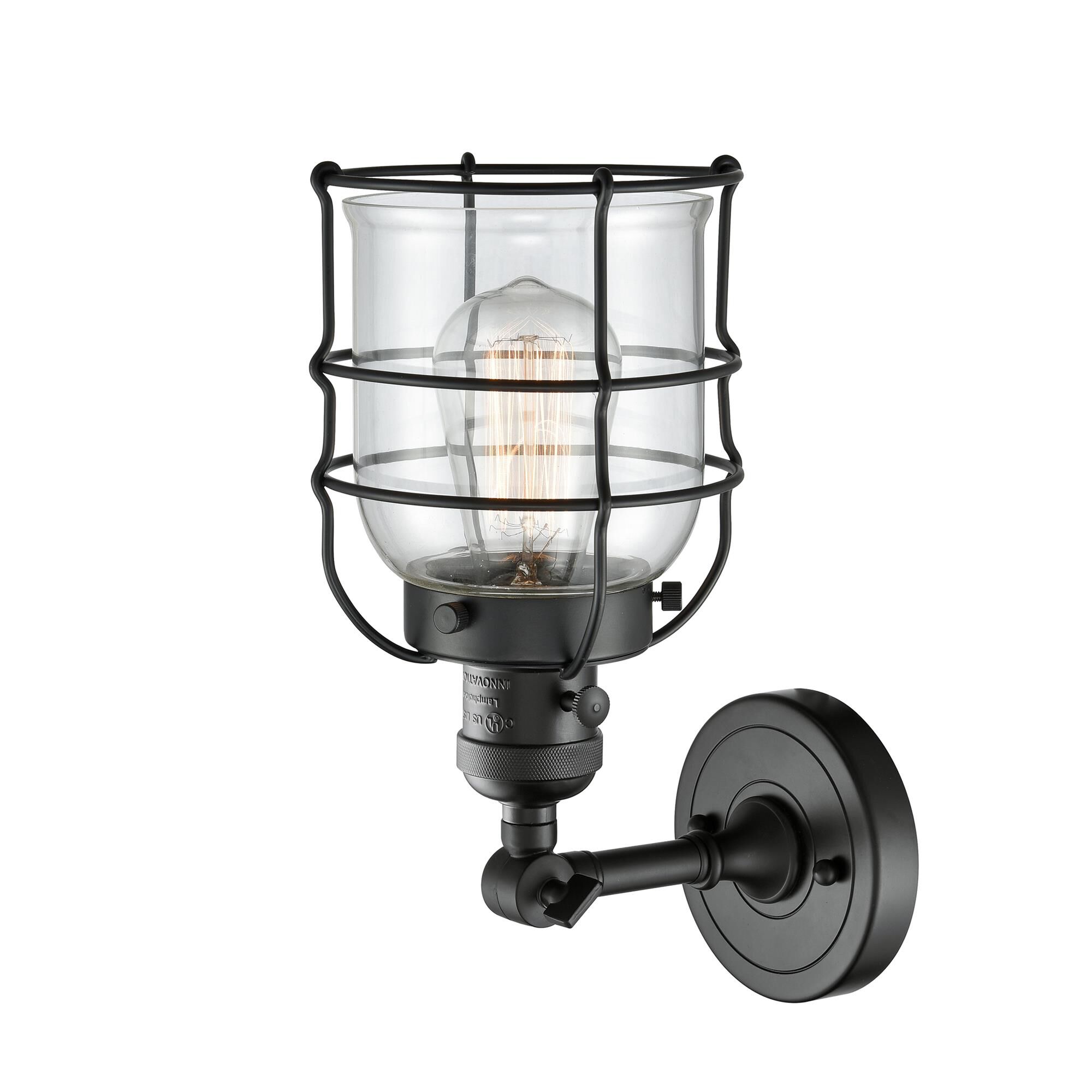 Shown in Matte Black finish and Clear glass and Switch on Socket accent