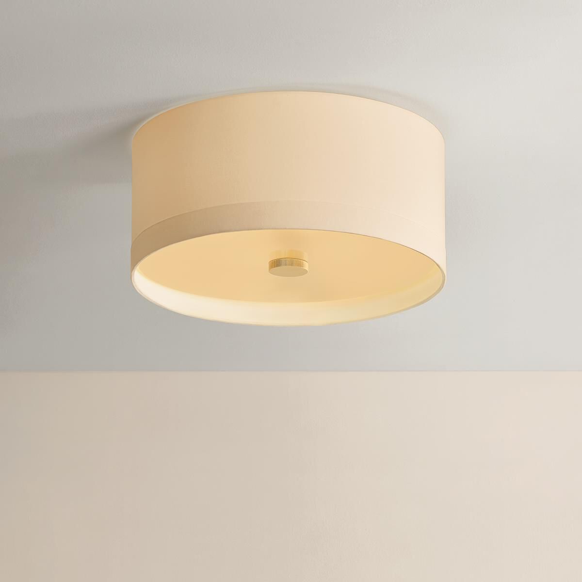 Shown in Aged Brass finish and White Linen shade