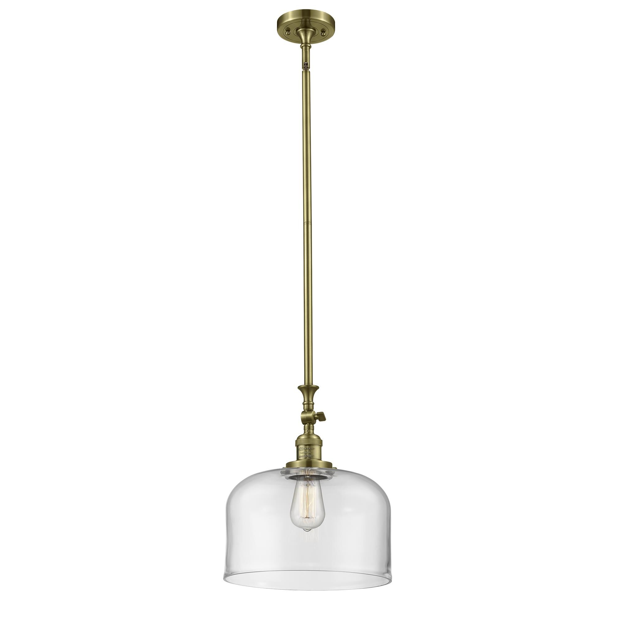 Shown in Antique Brass finish and Clear glass