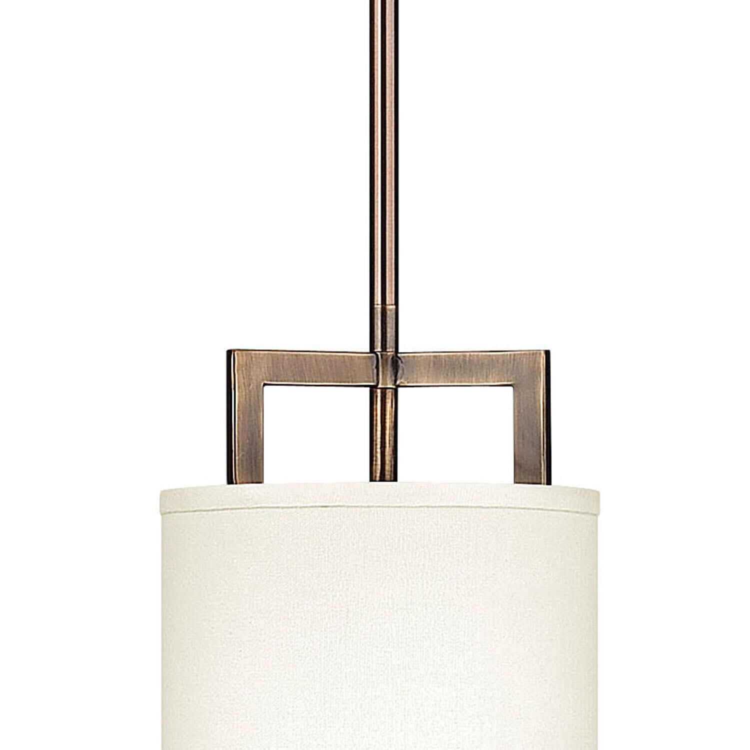 Shown in Brushed Bronze finish and Off-White Linen Hardback shade