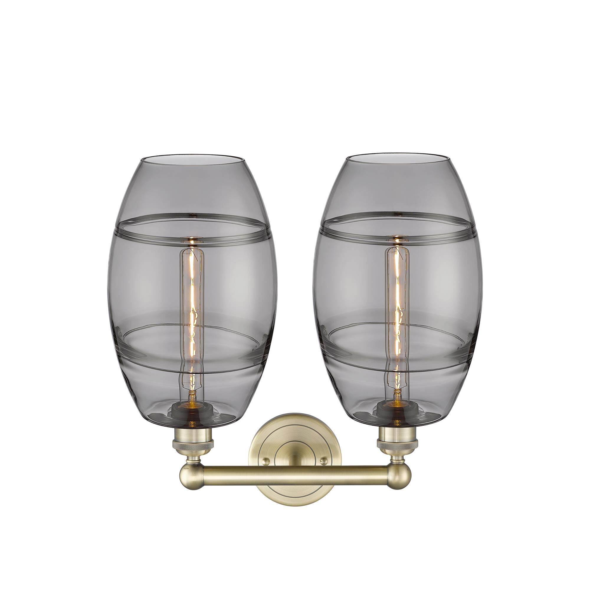 Shown in Antique Brass finish and Light Smoke glass