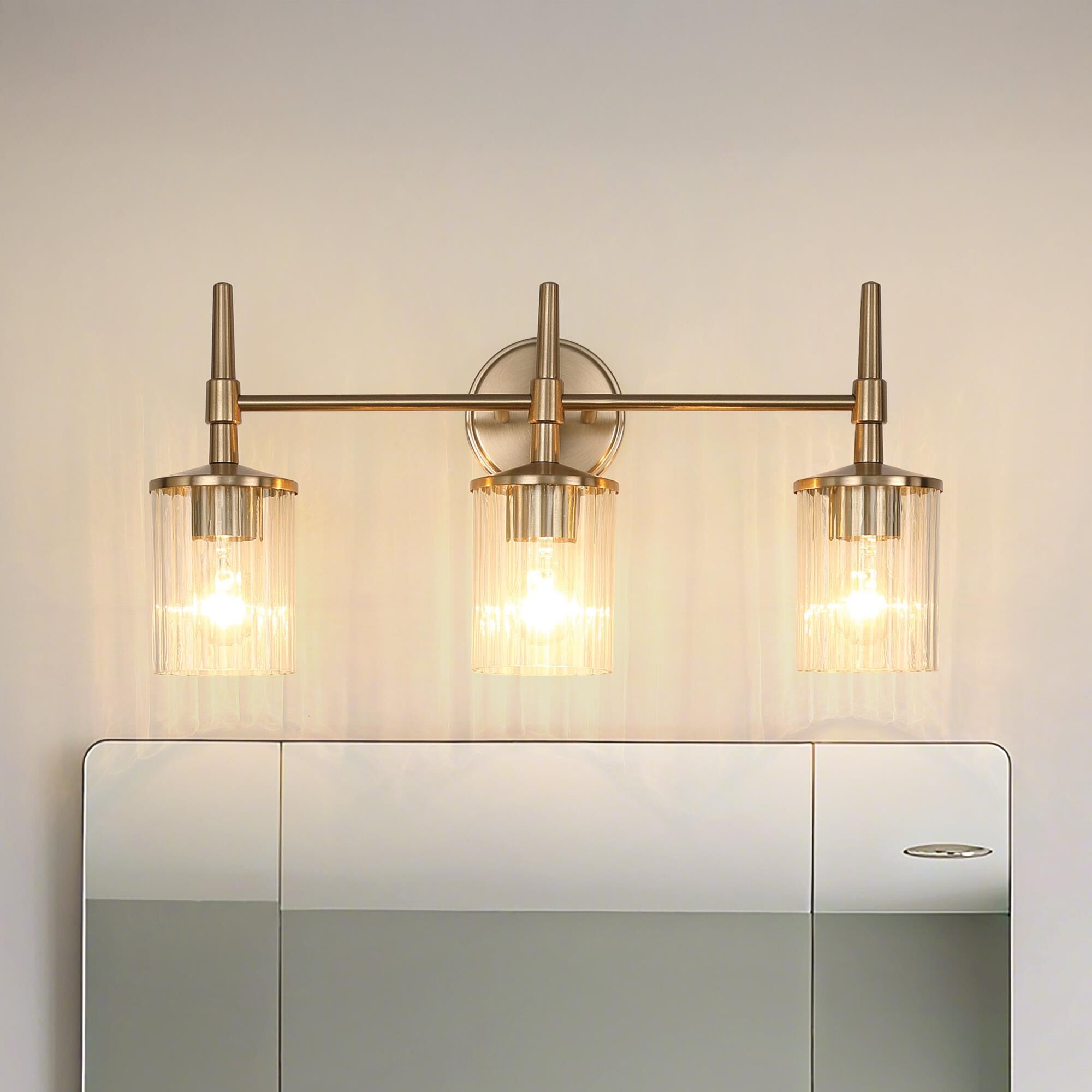 Shown in Champagne Gold finish and Clear Ribbed glass