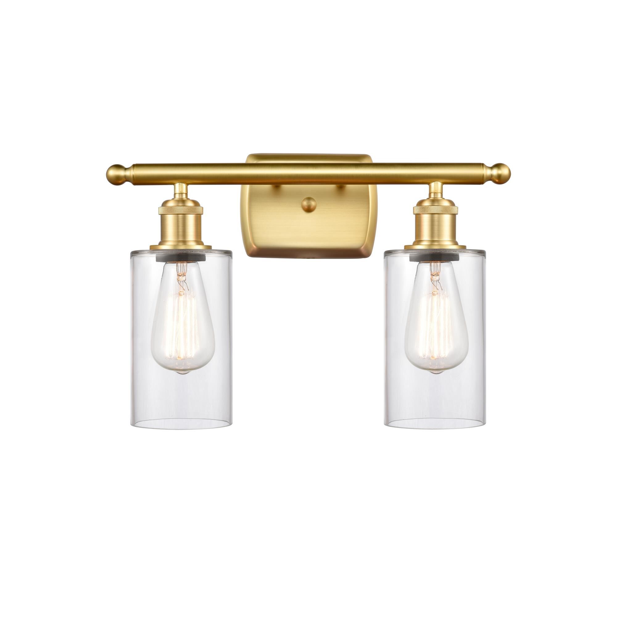 Shown in Satin Gold finish and Drum glass and Glass shade and Polished Chrome accent