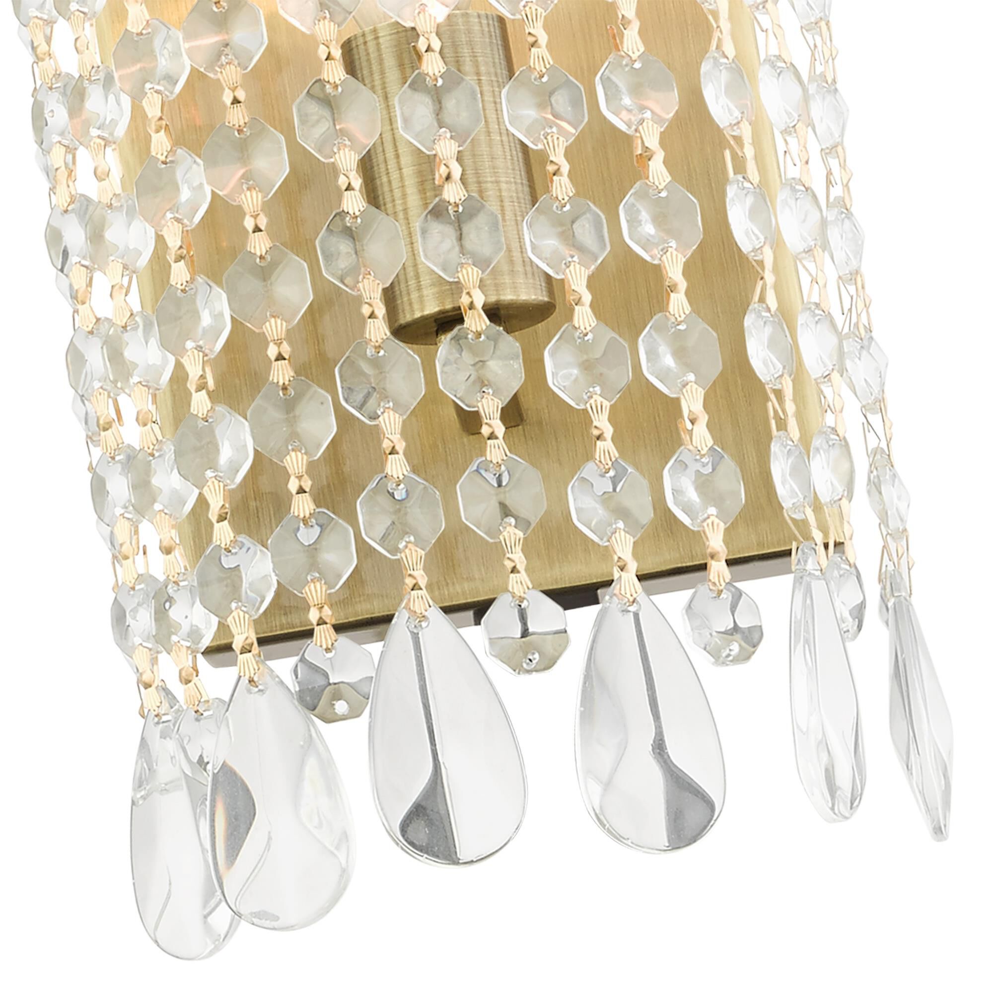 Shown in Antique Brass finish and Hand Assembled Crystal Shade glass