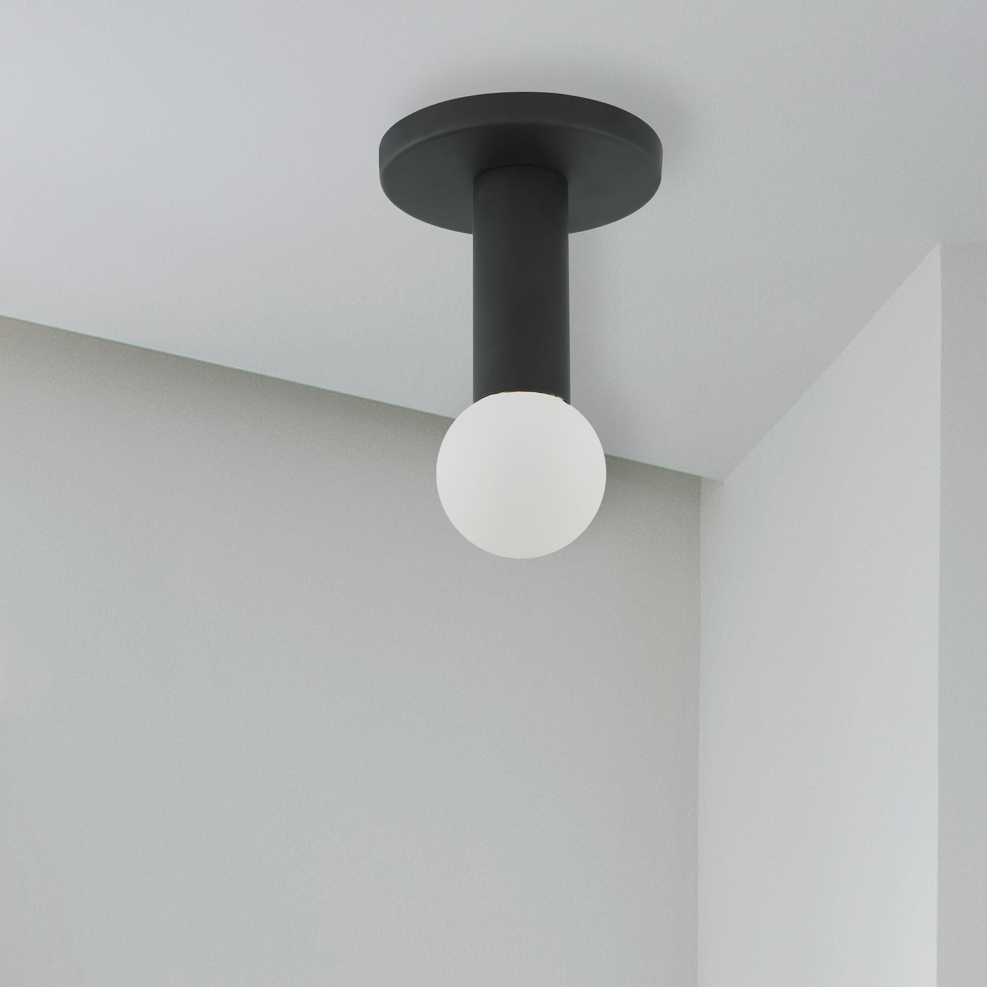 Shown in Black finish and White Globe glass