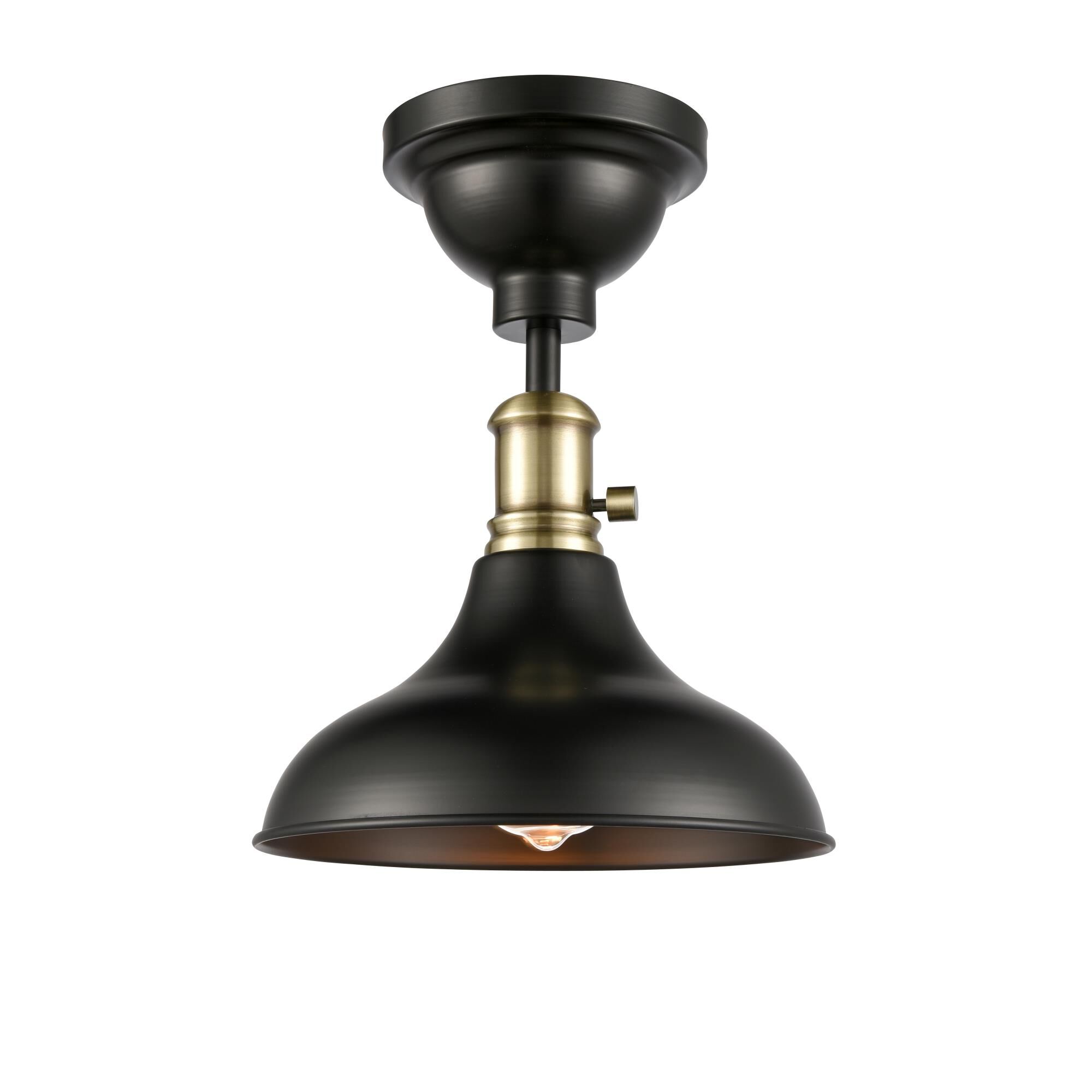 Shown in Black Antique Brass finish and Matte Black Metro Metal shade and Antique Brass accent