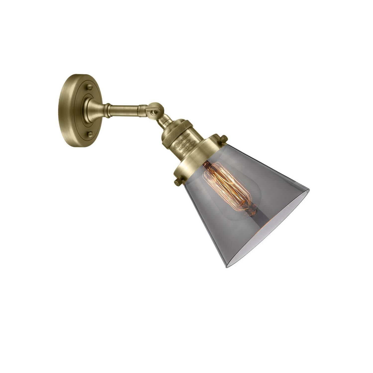 Shown in Antique Brass finish and Smoked glass and None accent