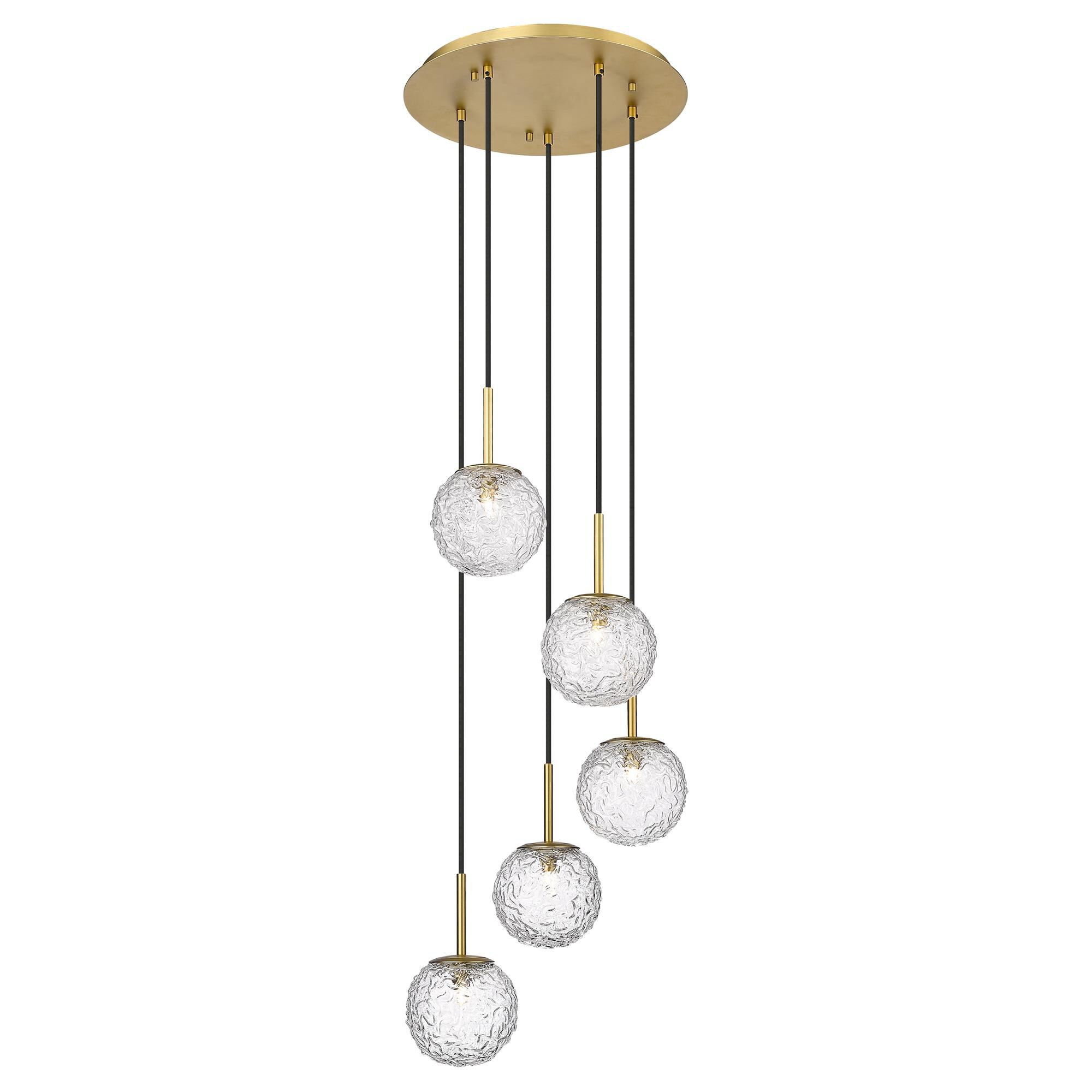 Shown in Brushed Brass finish and Clear shade
