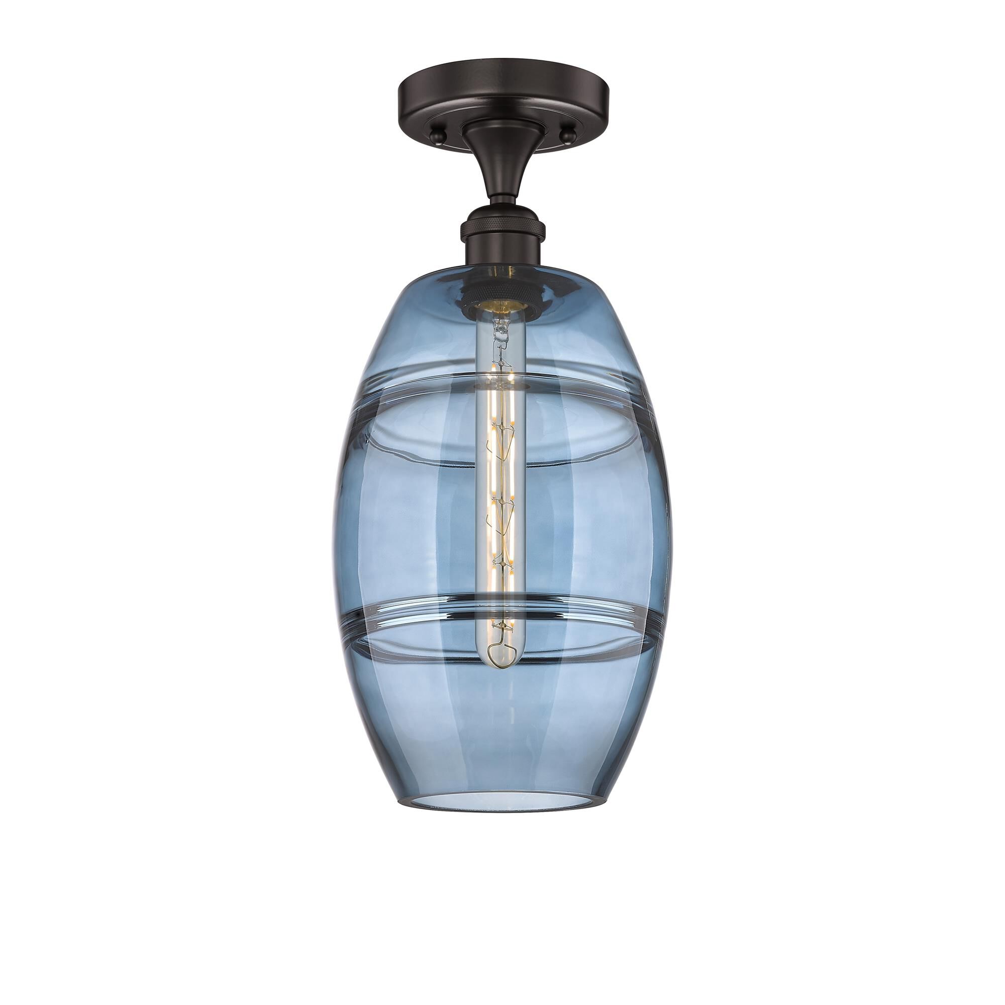 Shown in Oil Rubbed Bronze finish and Princess Blue glass