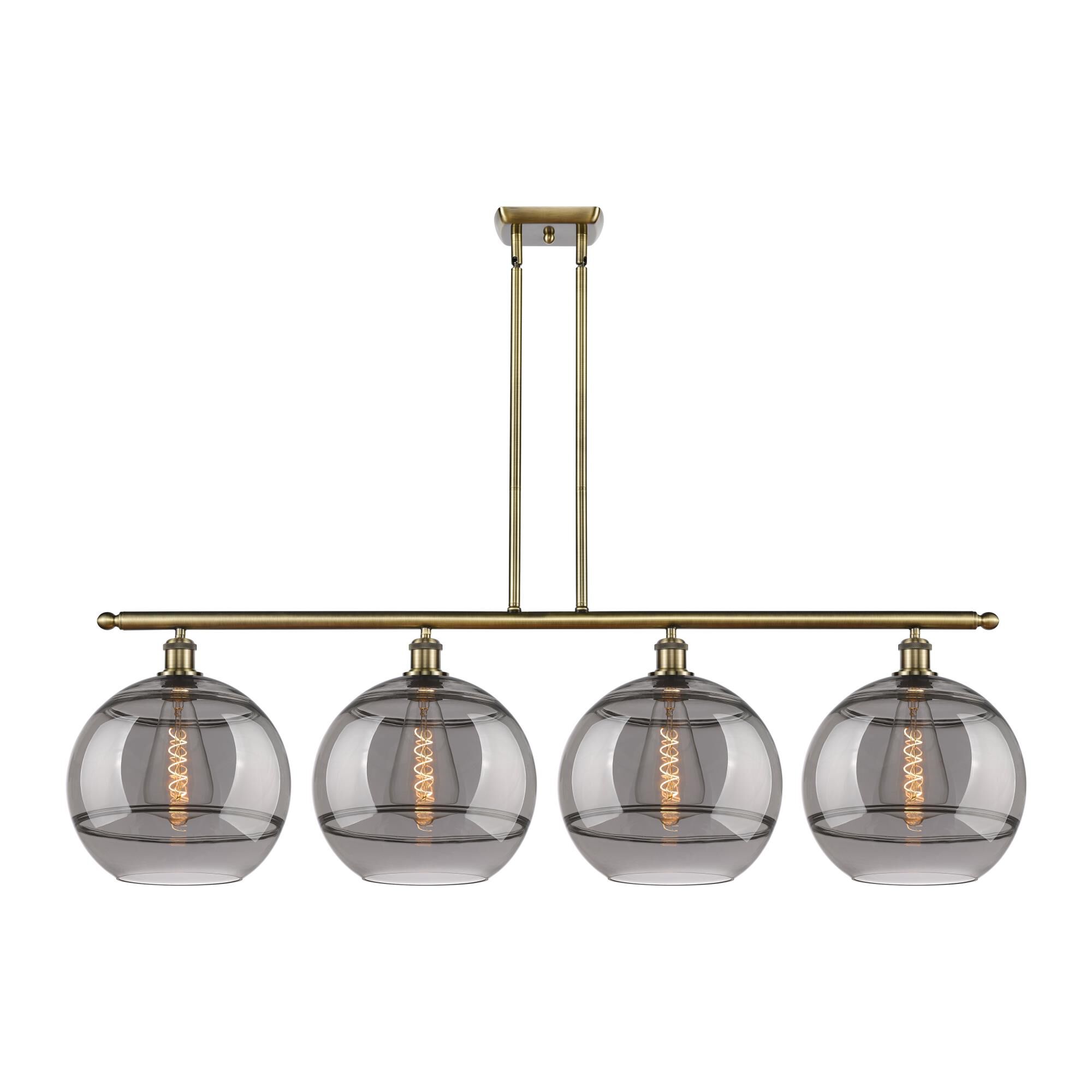Shown in Antique Brass finish and Light Smoke glass