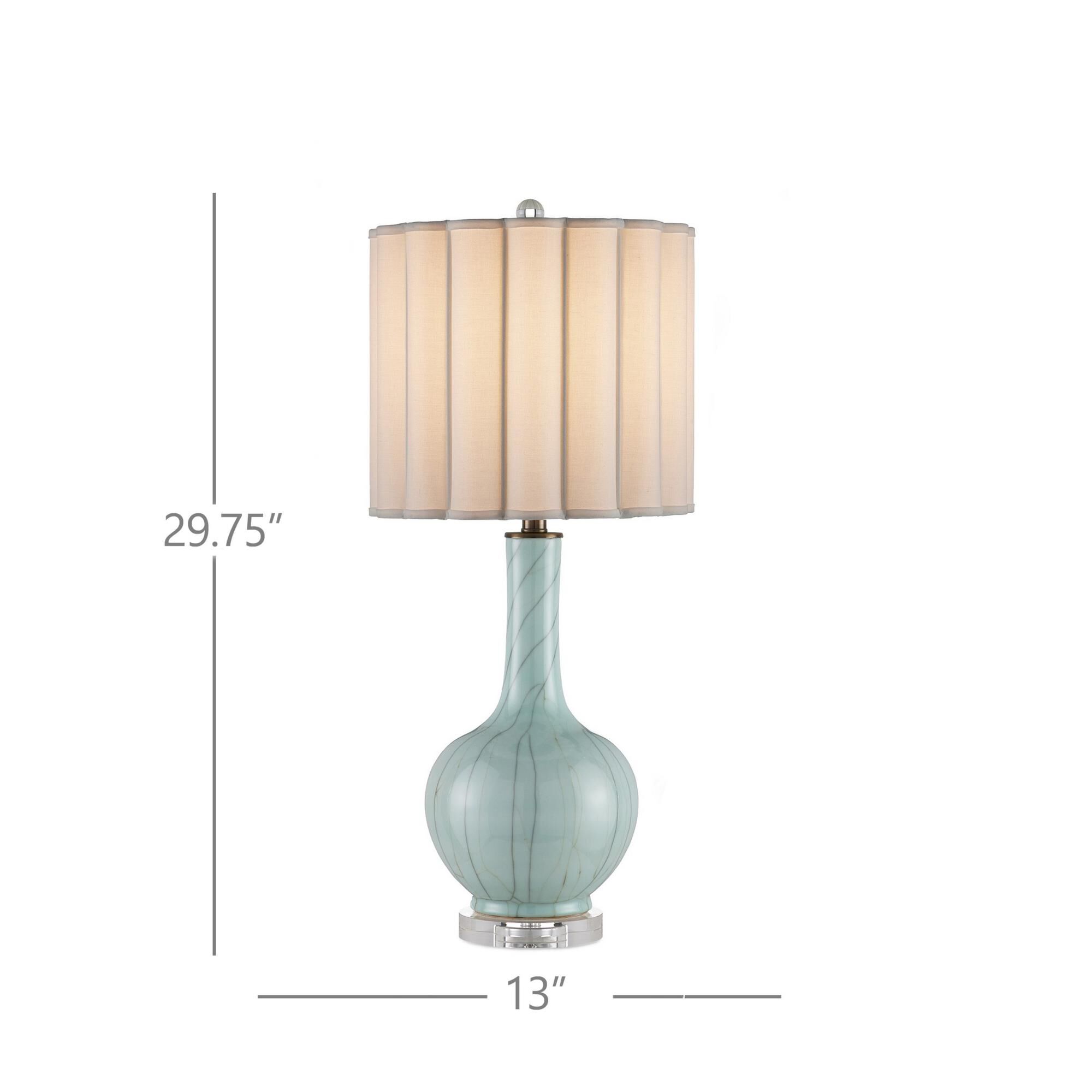 Shown in Celadon Crackle, Clear, Antique Brass finish and Scalloped Bone Linen shade