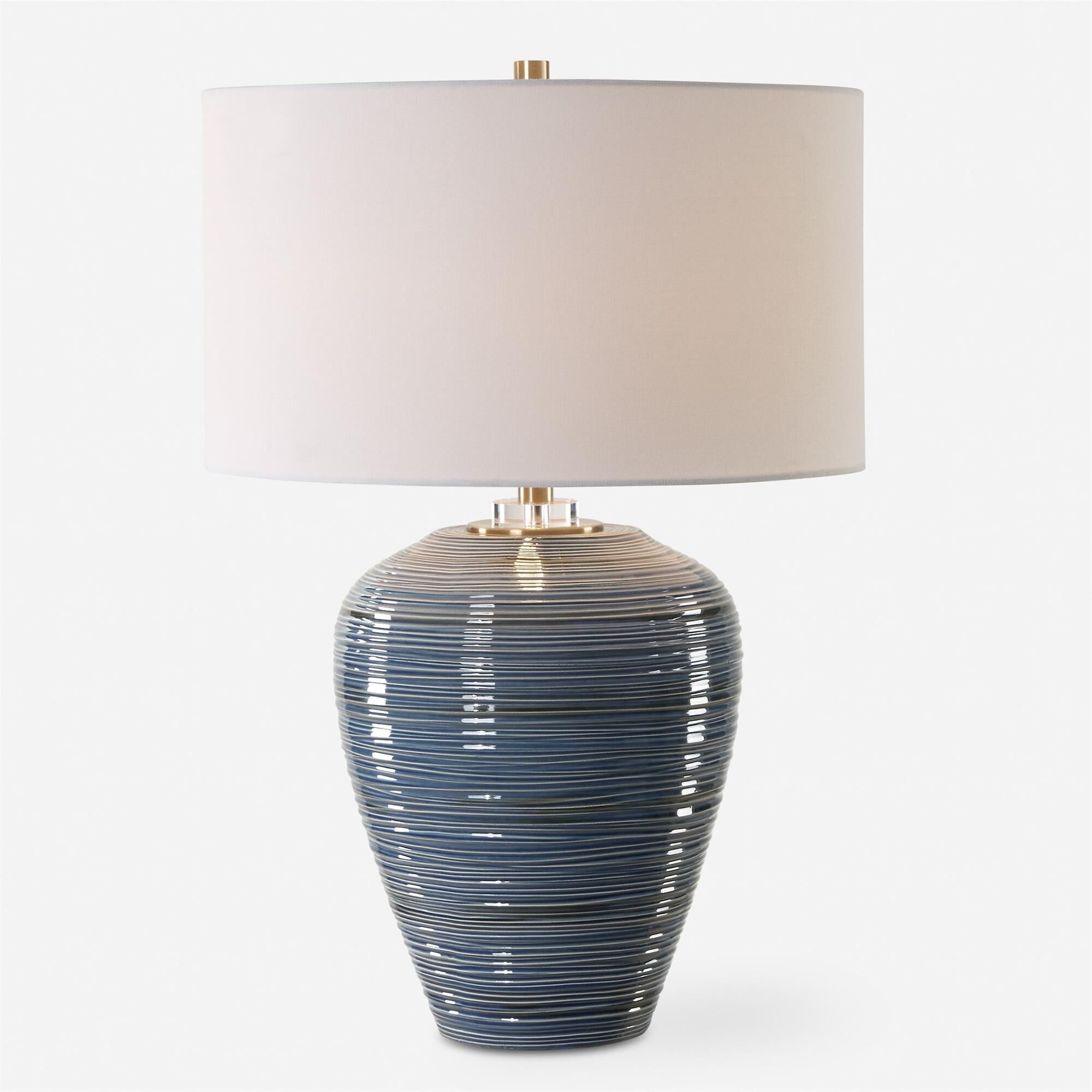 Shown in Illuminate Your Space With This Stunning Table Lamp, Featuring An Organically Ribbed Texture, Finish finish and Round Drum Hardback shade