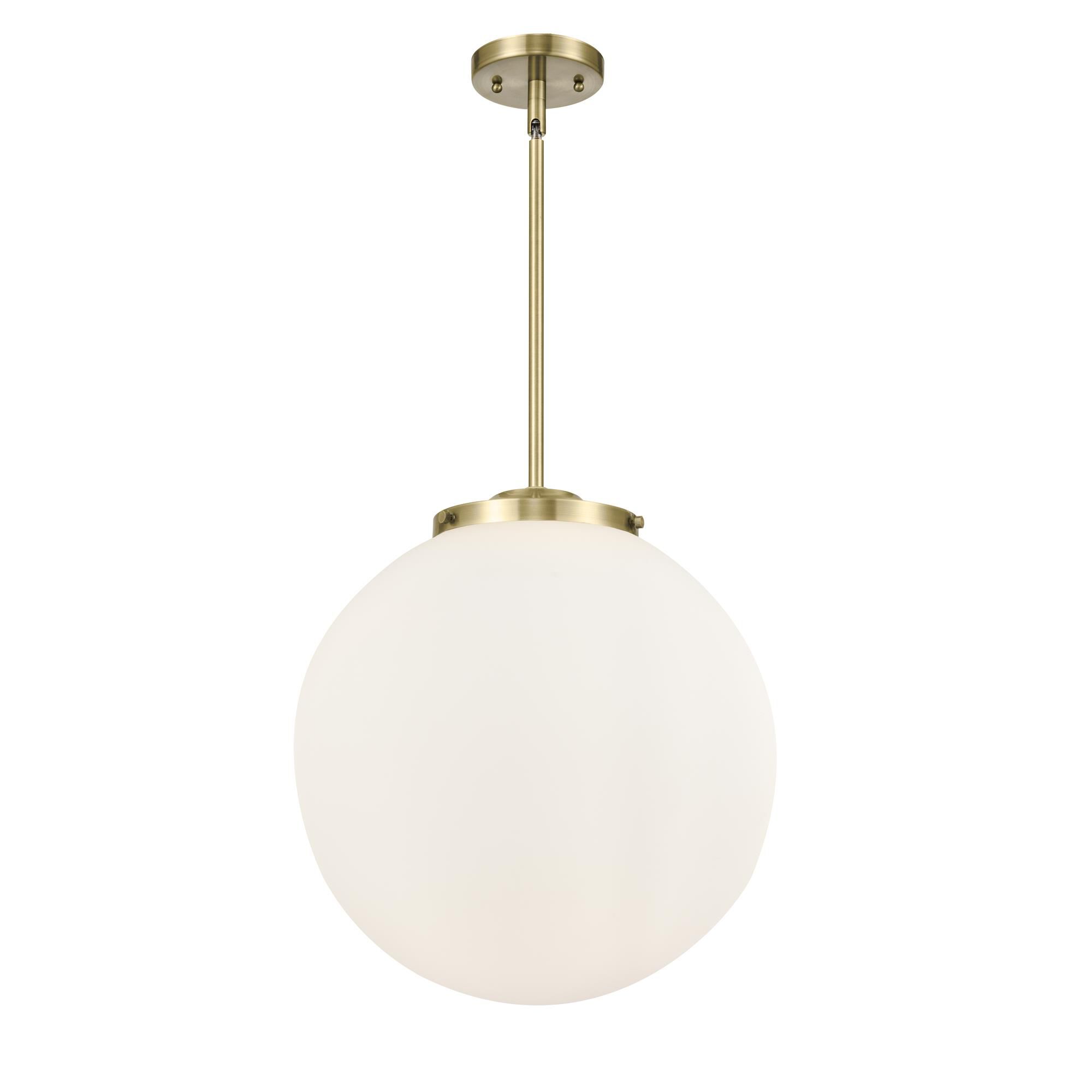 Shown in Antique Brass finish and Matte White glass