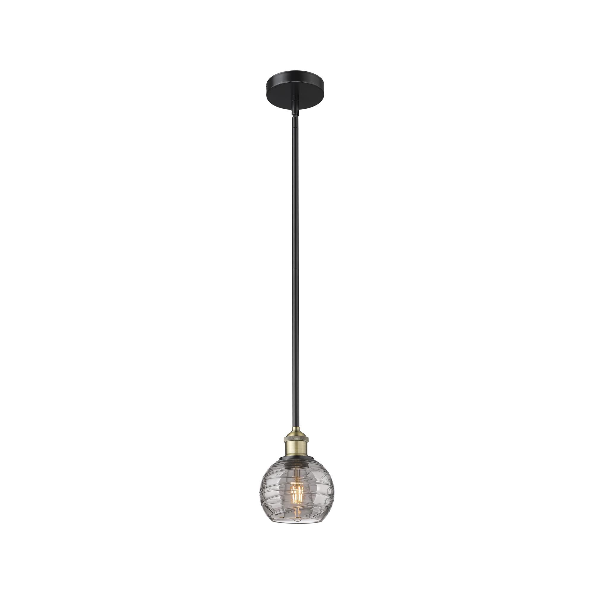 Shown in Black Antique Brass finish and Light Smoke Deco Swirl glass