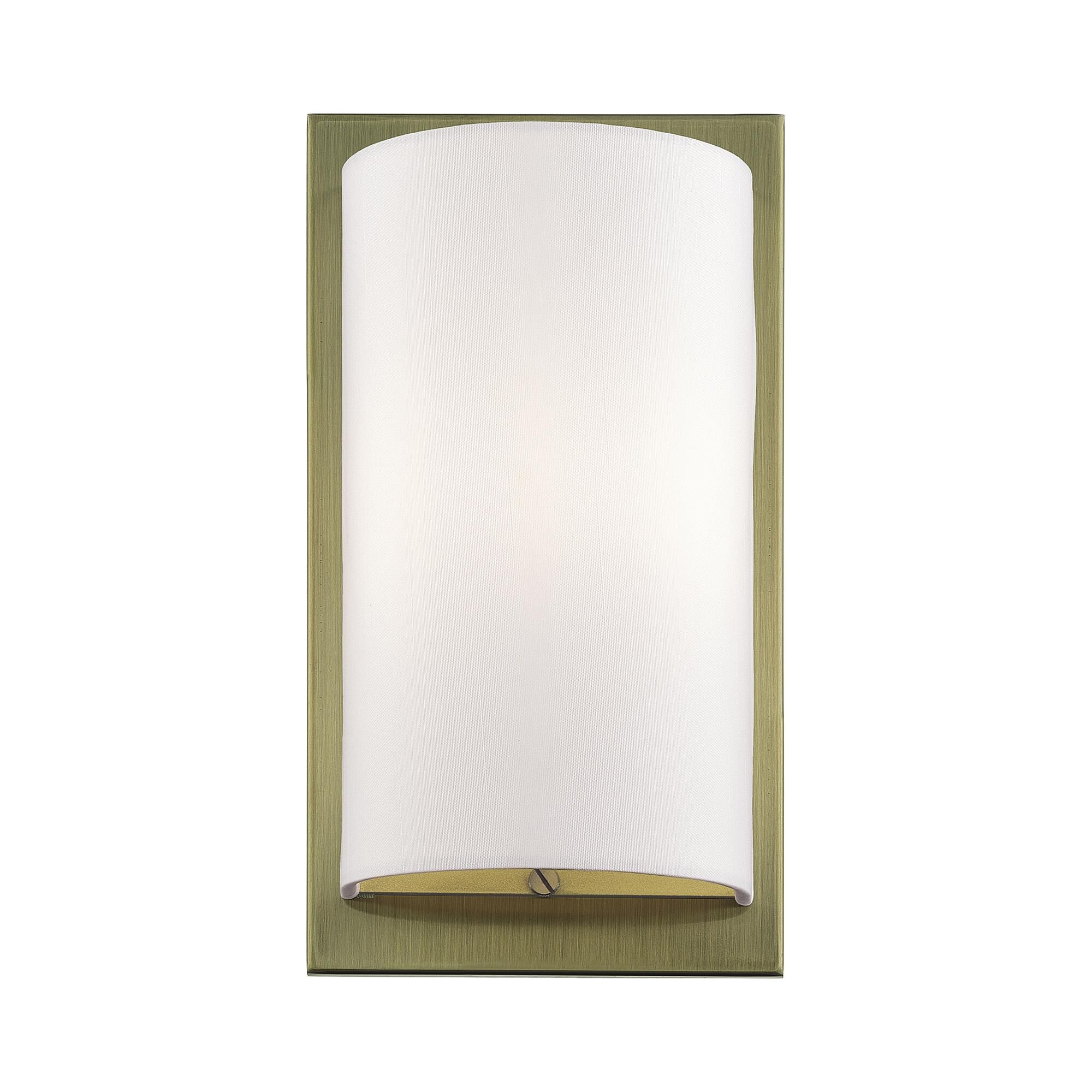 Shown in Antique Brass finish and Hand Crafted Off-White Fabric Hardback shade