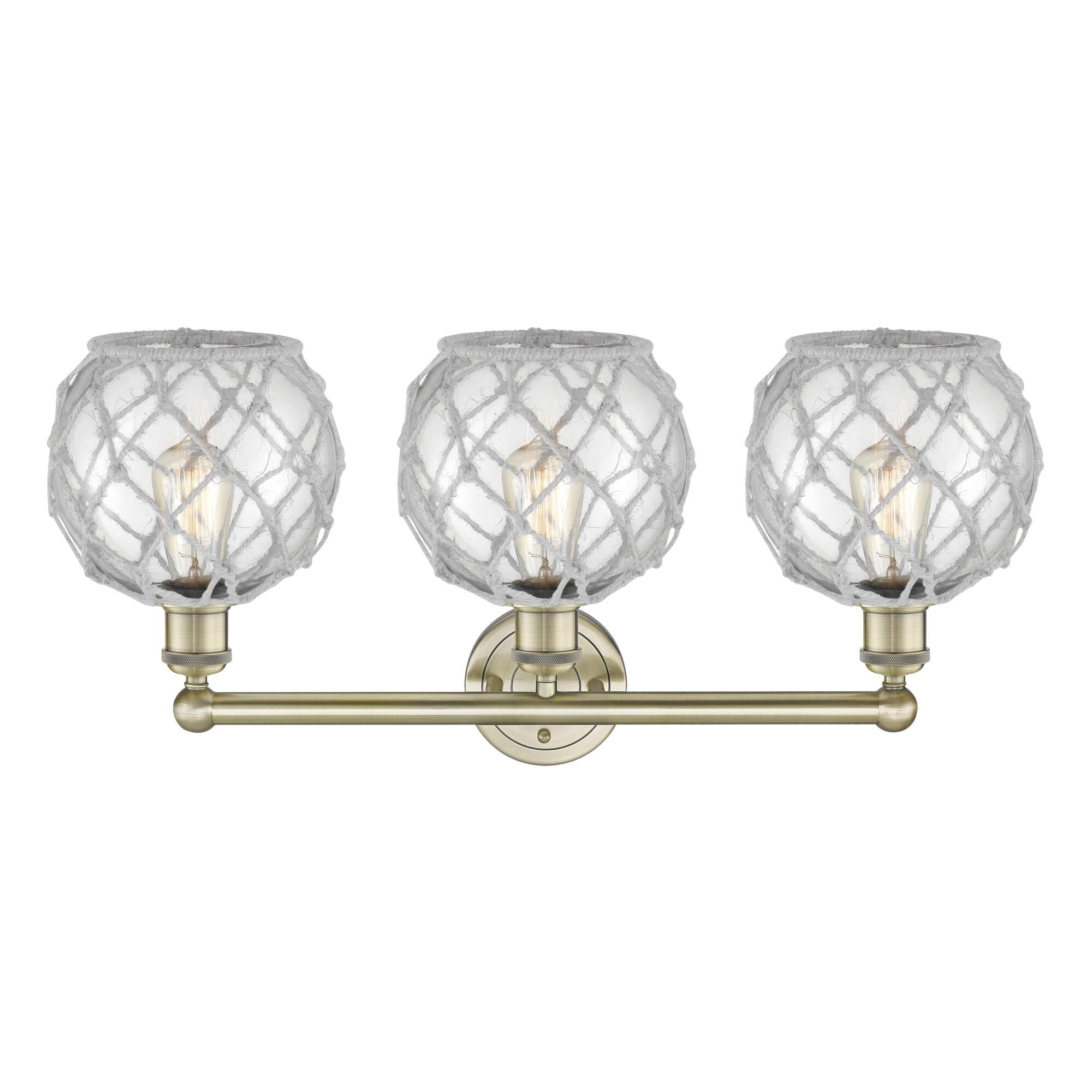 Shown in Antique Brass finish and Clear with White Rope glass