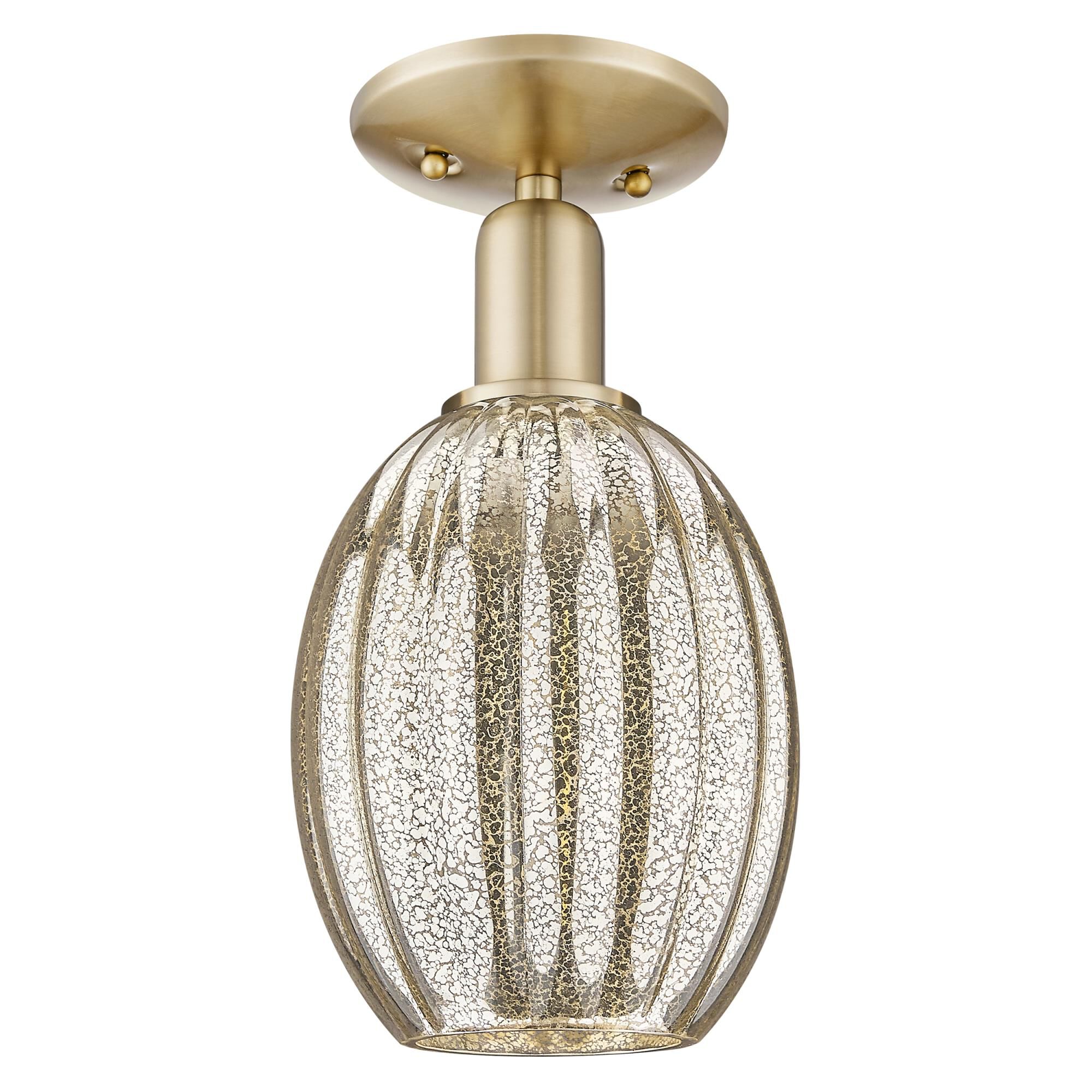 Shown in Champagne Bronze finish and Mercury glass