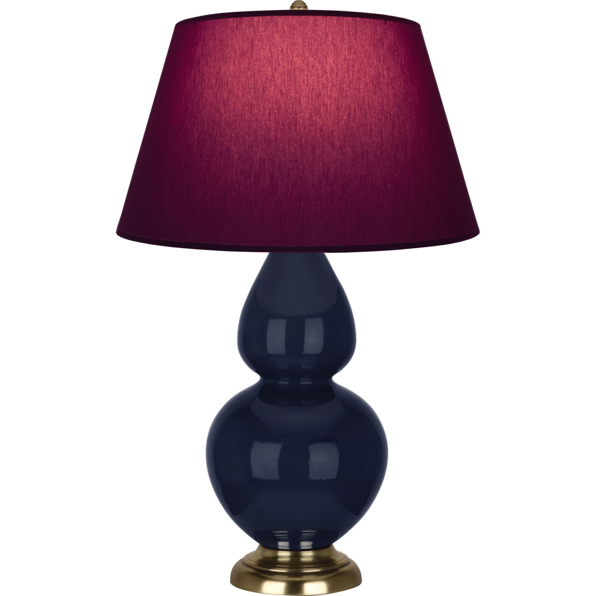 Shown in Midnight Blue finish and Plum and Lavender shade and Antique Brass accent