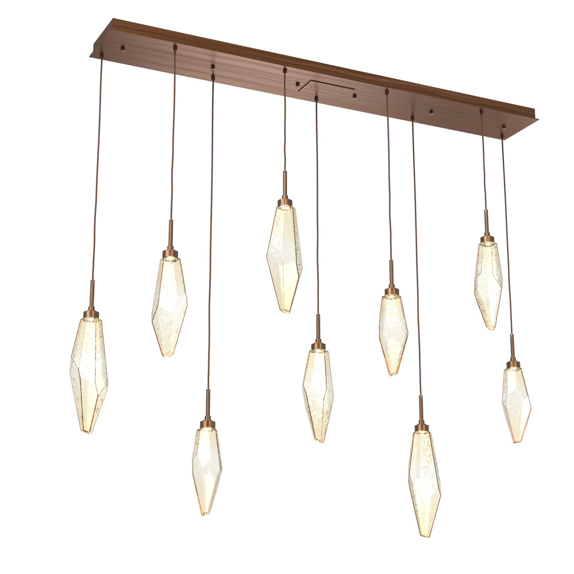 Shown in Burnished Brass finish and Chilled Amber glass