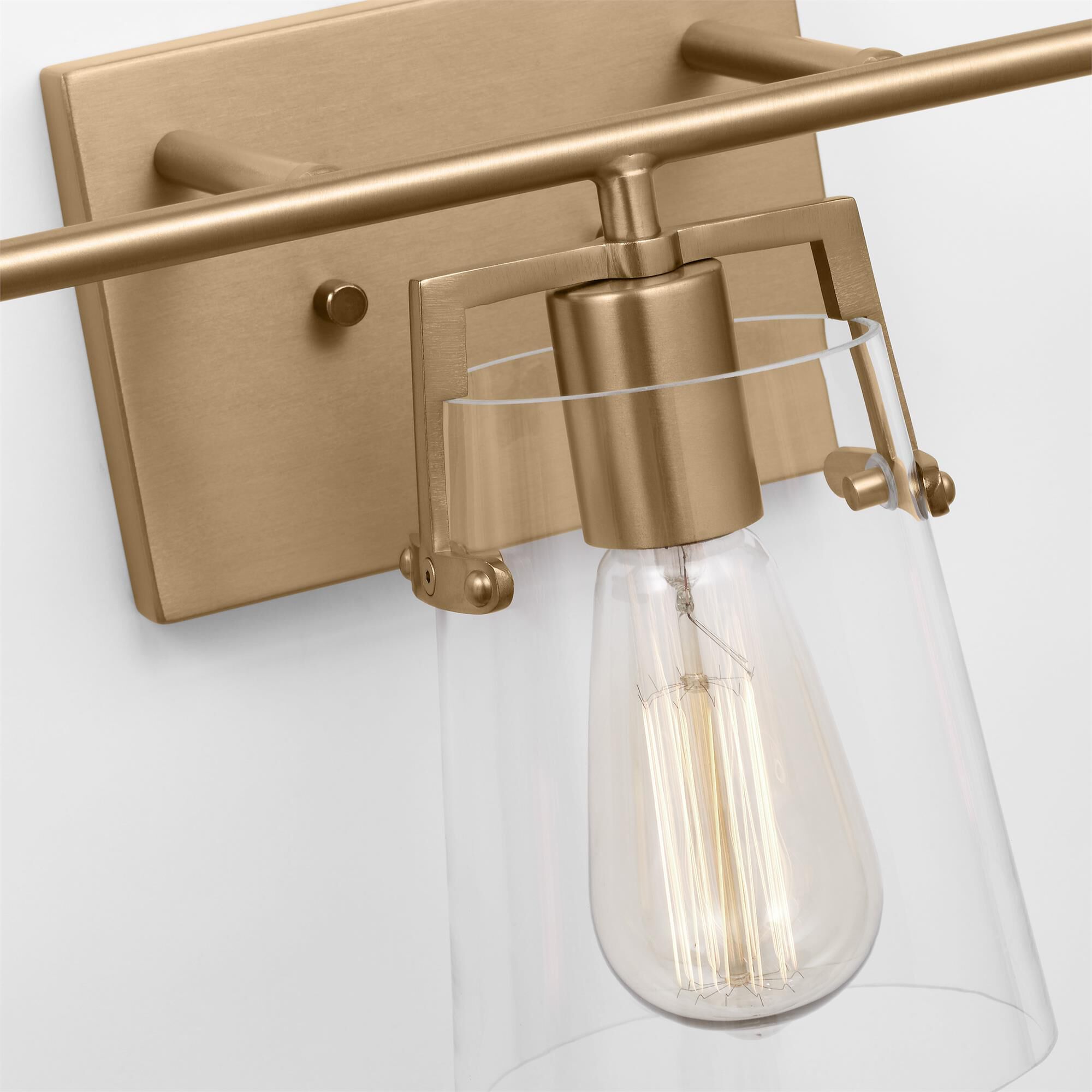 Shown in Satin Brass finish and Clear Glass s shade