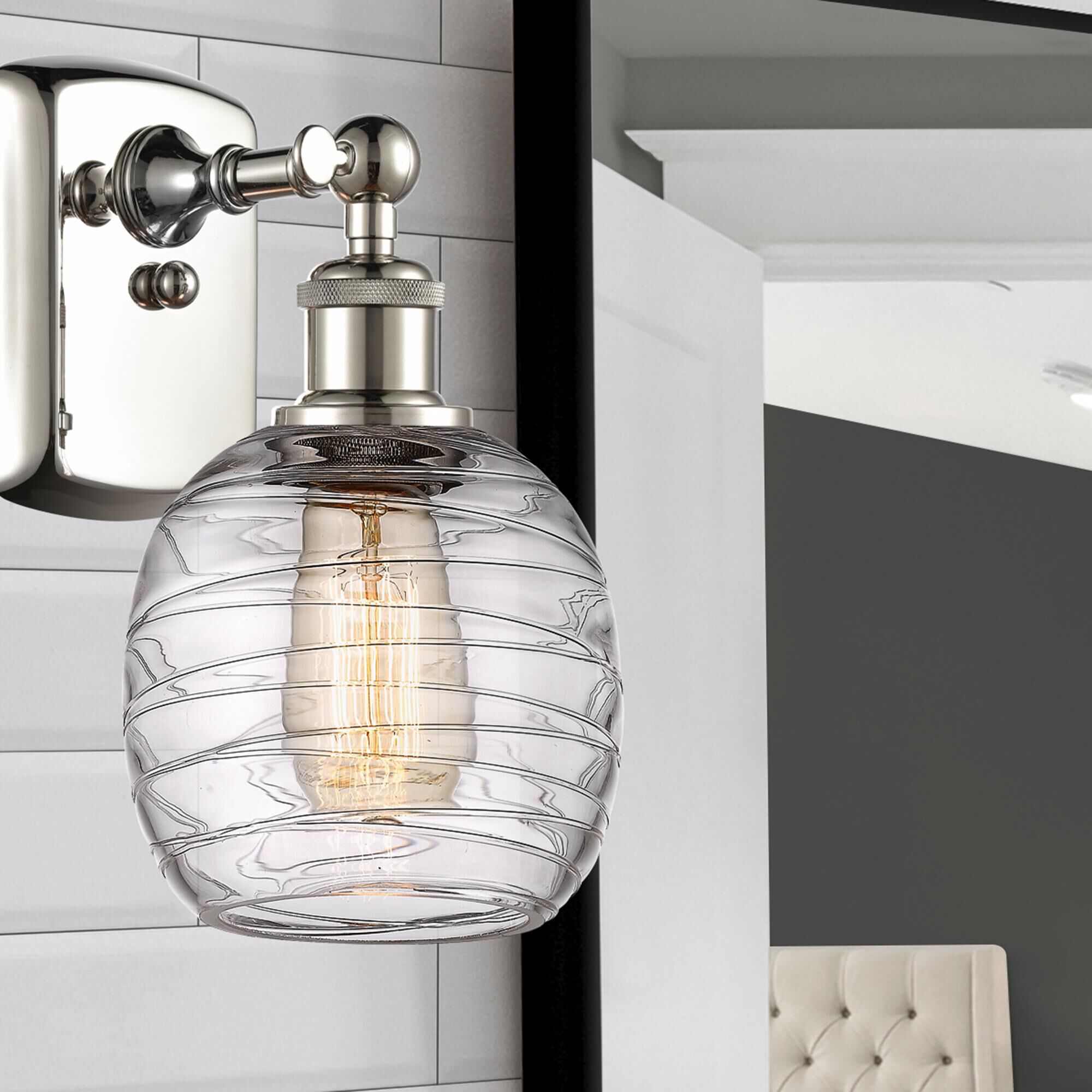 Shown in Polished Nickel finish and Deco Swirl glass