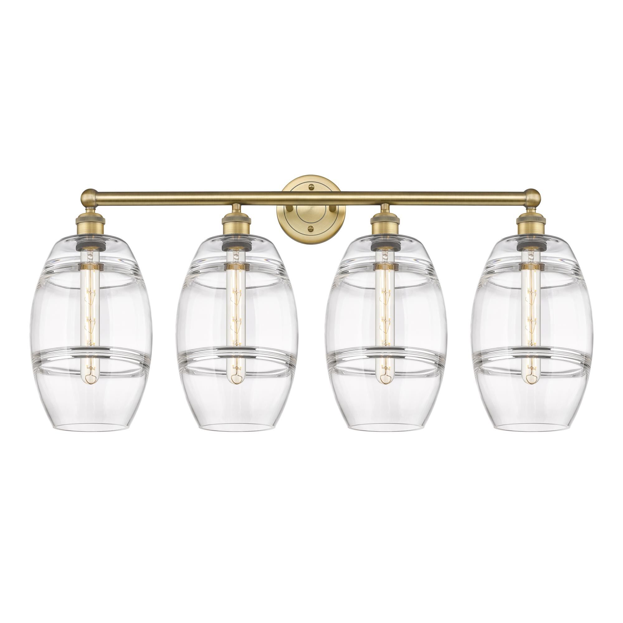 Shown in Brushed Brass finish and Clear glass