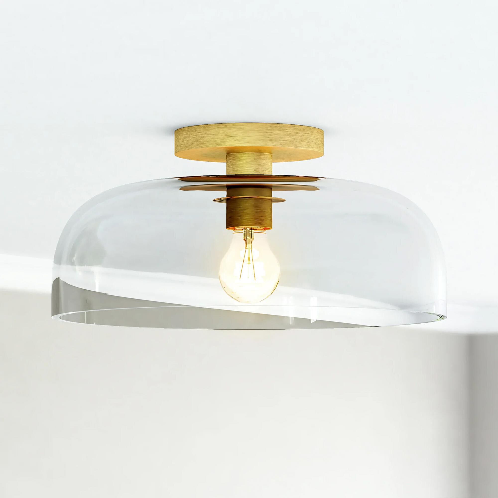 Shown in Brushed Gold finish and Clear glass