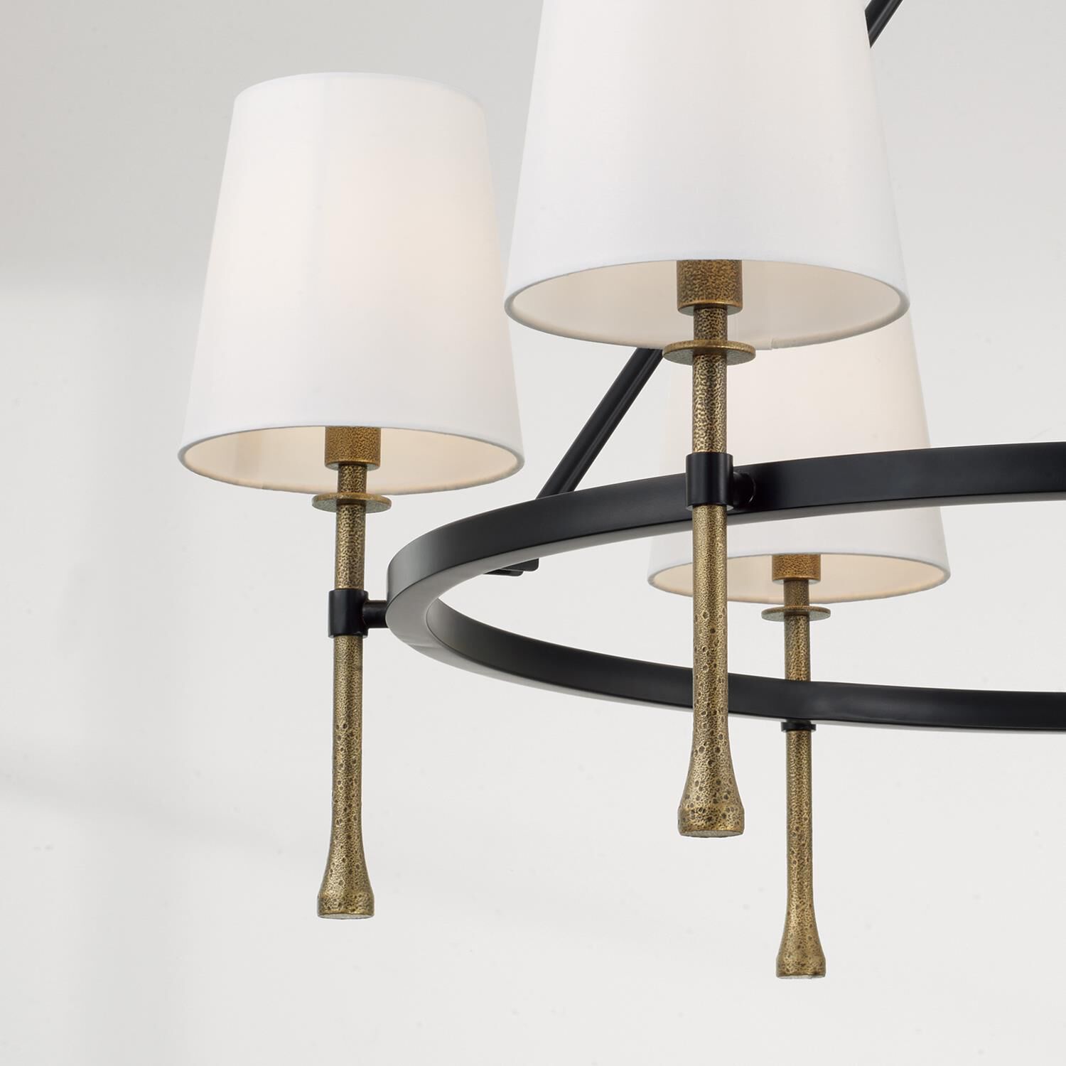 Shown in Matte Black With Hammered Gold finish and White Fabric Stay-Straight s shade