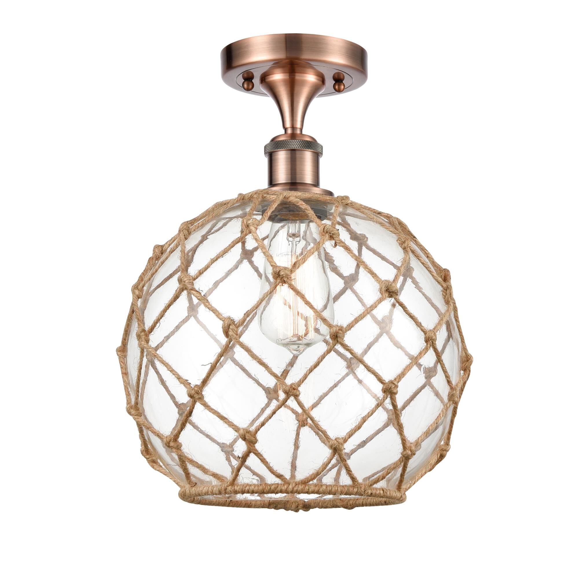 Shown in Antique Copper finish and Sphere glass and Glass And Rope shade