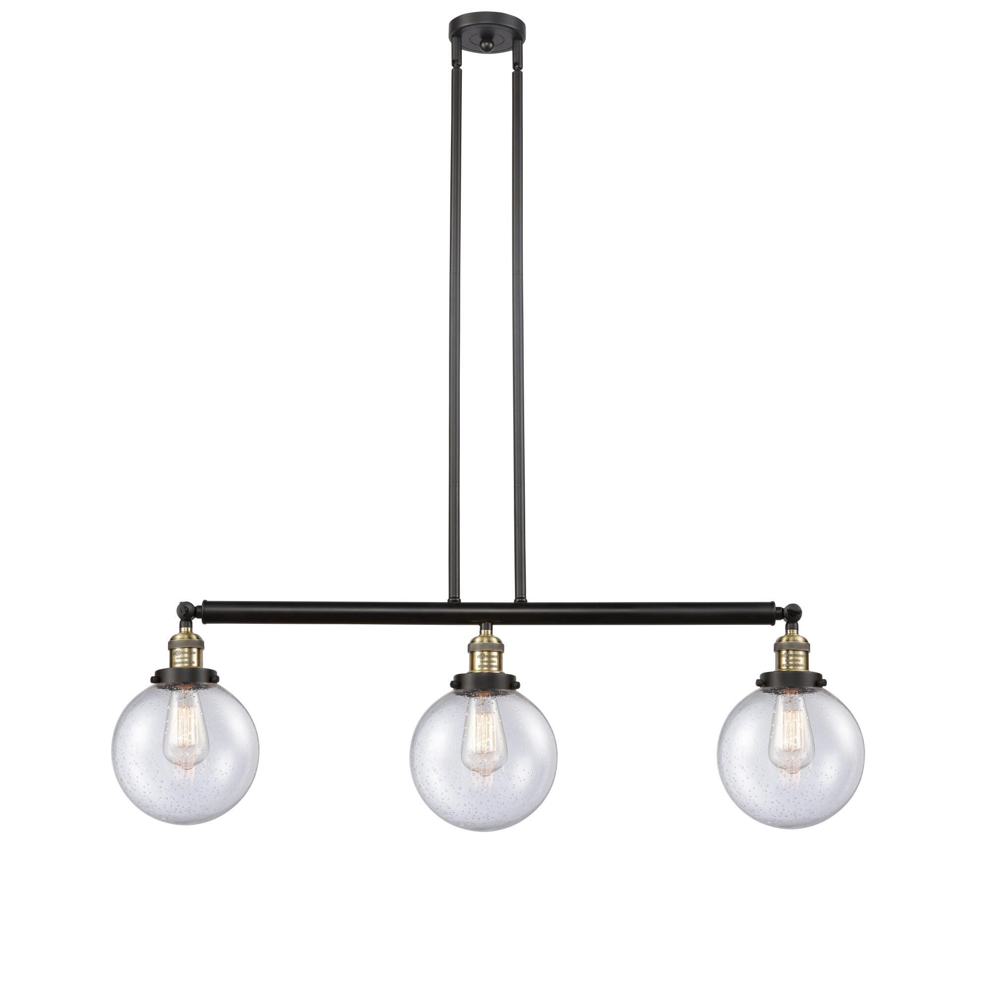 Shown in Black Antique Brass finish and Seedy Beacon glass