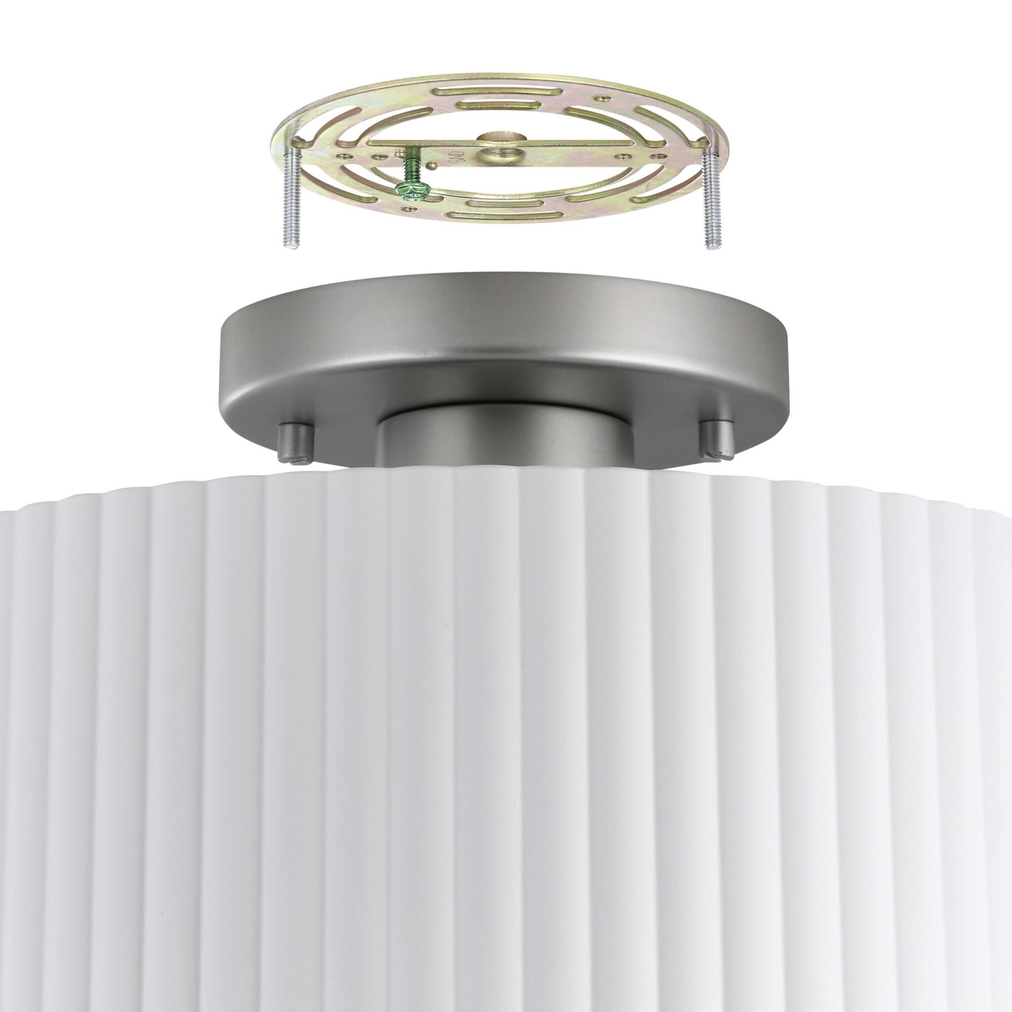 Shown in Brushed Nickel finish and Matte White shade