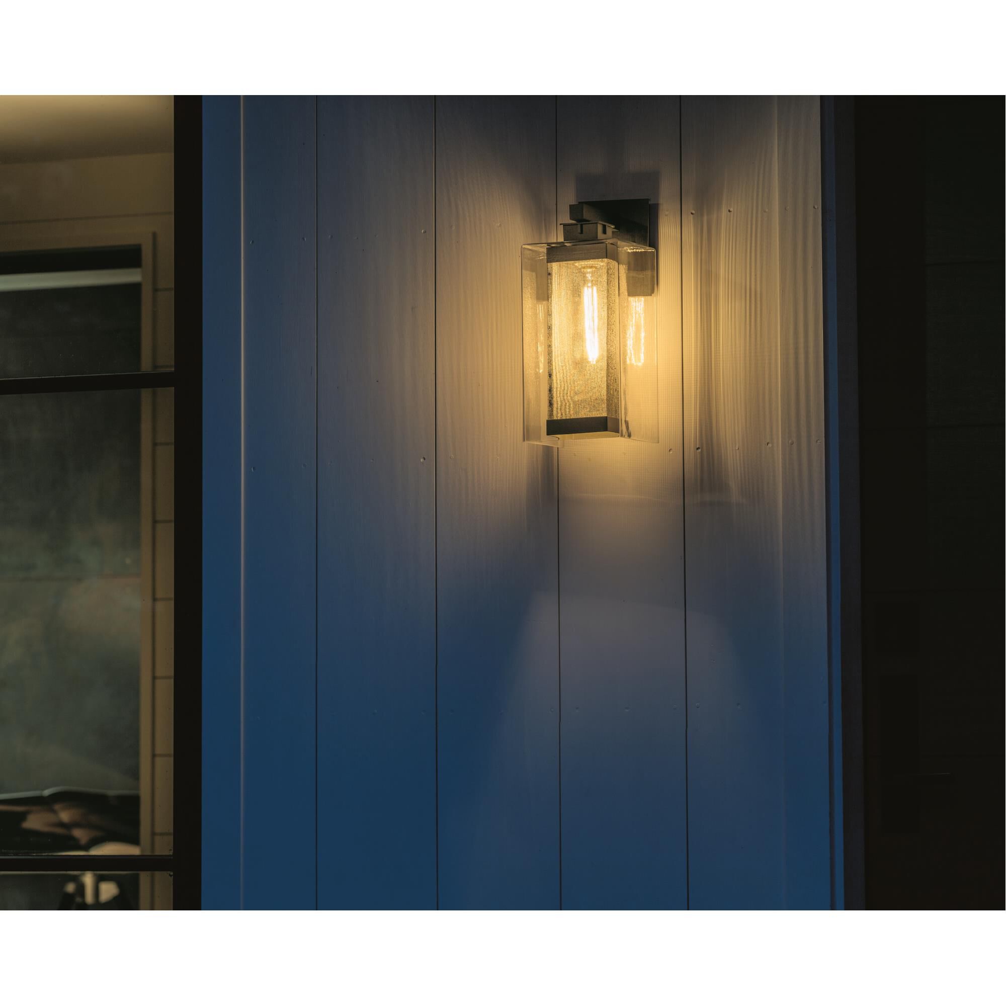 Shown in Coastal Black finish and Clear glass and Outdoor Silver accent