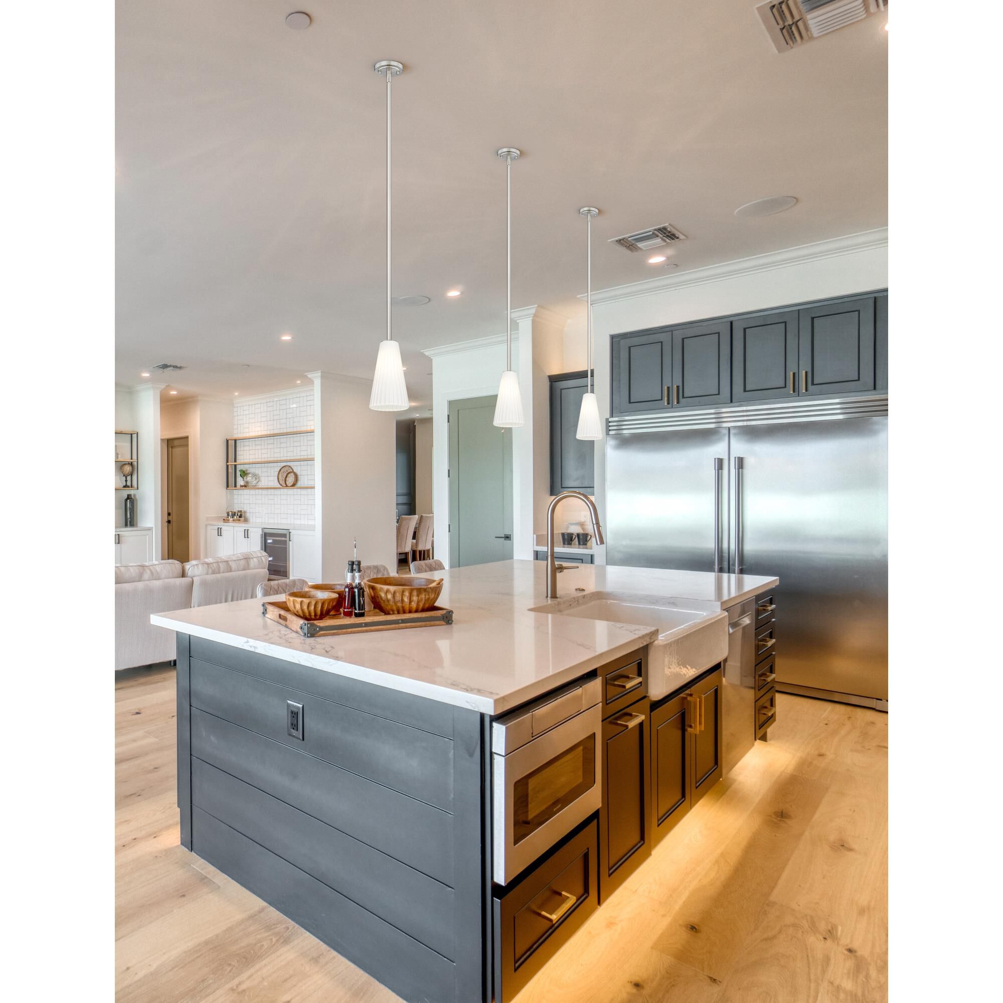 Shown in Brushed Nickel finish and White glass and White shade